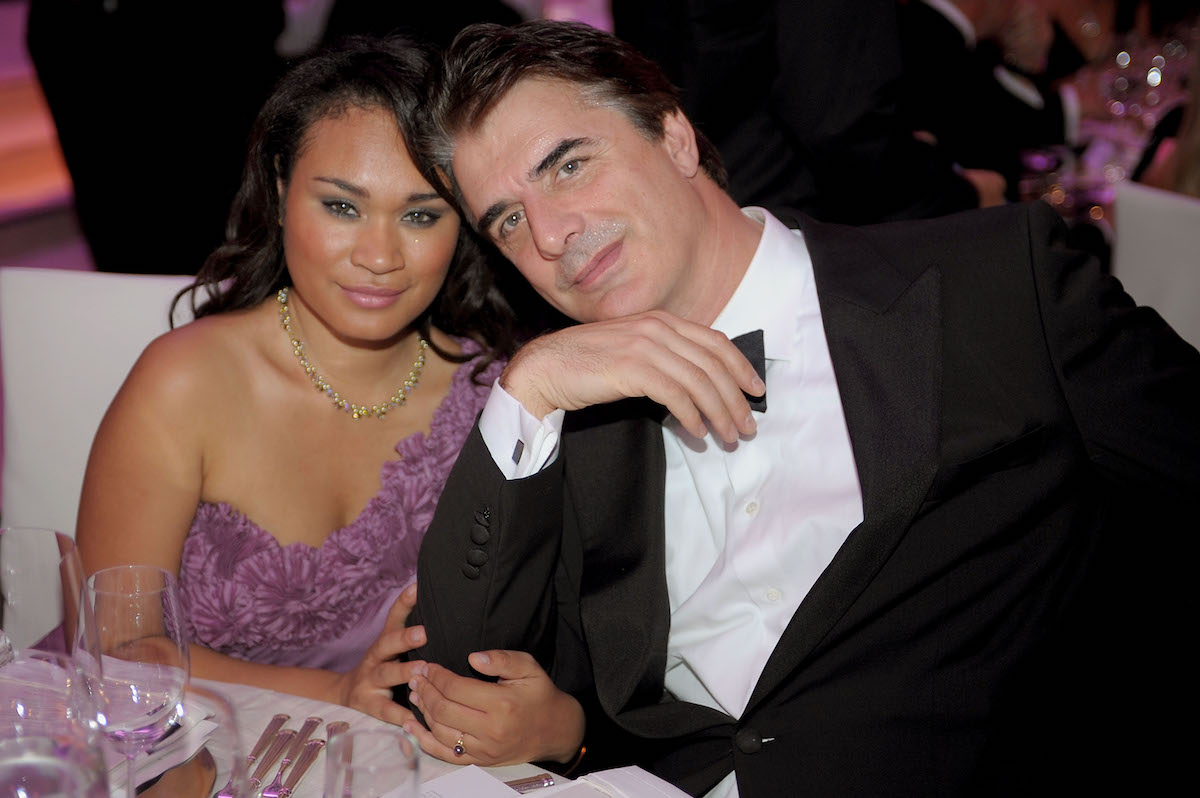 Tara Wilson and Chris Noth pose together at an event.