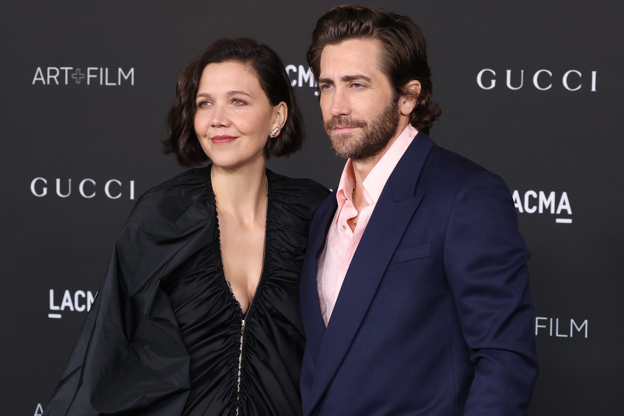 'The Lost Daughter' Maggie Gyllenhaal and Jake Gyllenhaal in front of a Gucci step and repeat