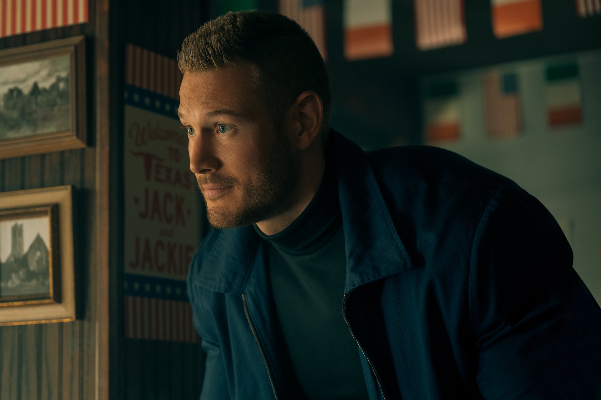 'The Umbrella Academy' character Luther seen here in a production still wearing a black shirt and black coat.