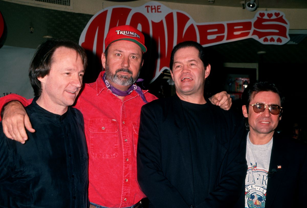 Peter Tork, Michael Nesmith, Micky Dolenz and Davy Jones of The Monkees pose together c. 1995