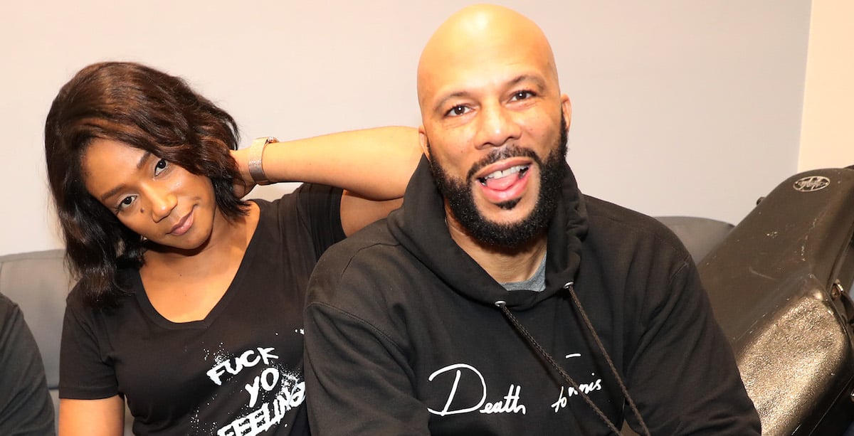 Tiffany Haddish and Common sit together