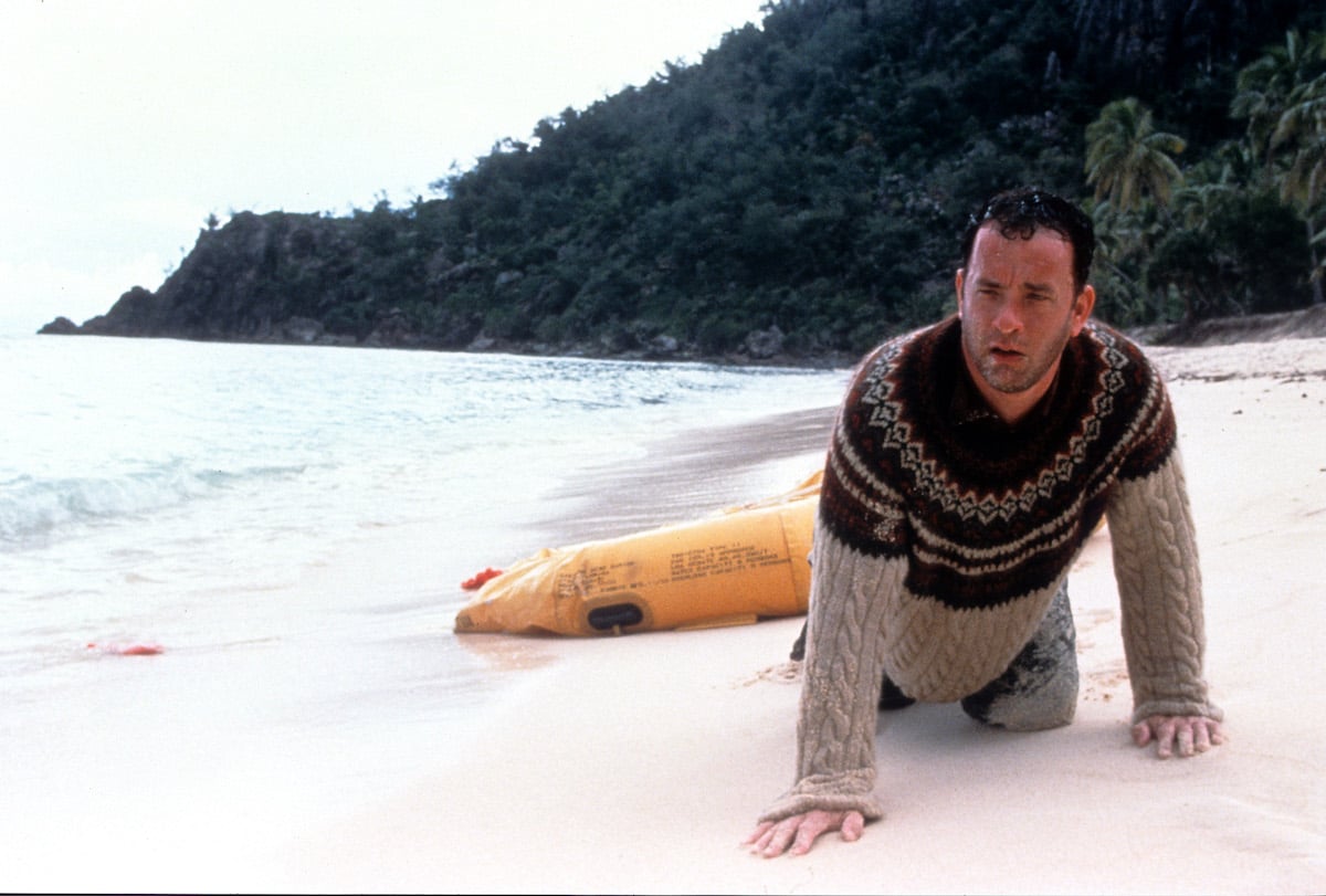 Tom Hanks washed up on the beach of an island in a scene from the 2000 film 'Cast Away'