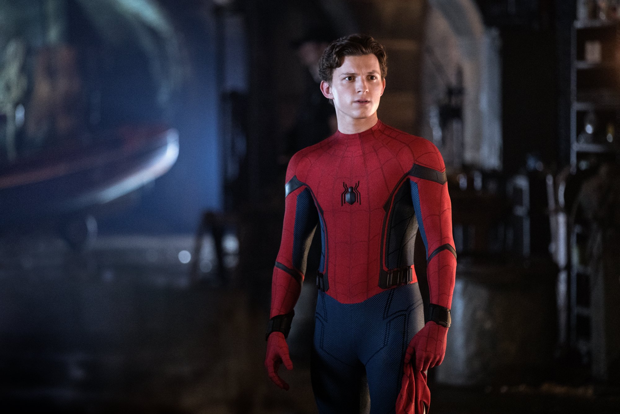 Tom Holland as Peter Parker:Spider-Man in suit with the mask off