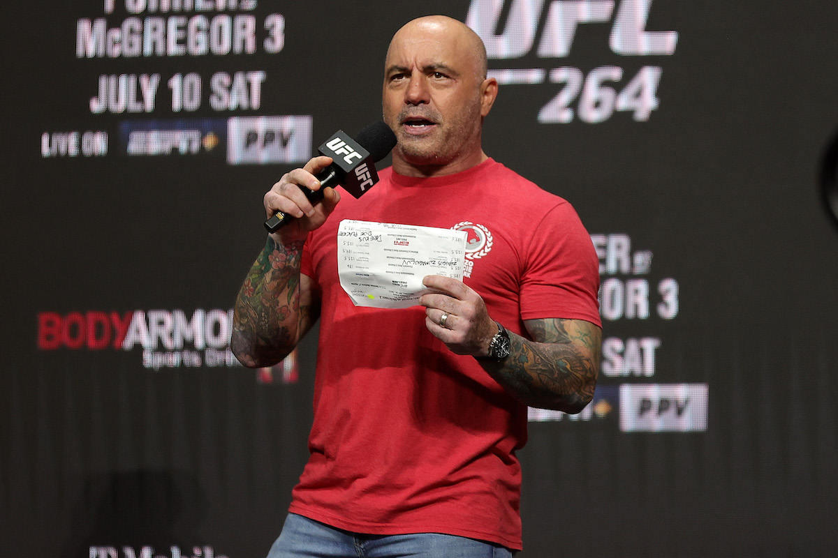 UFC commentator Joe Rogan announces fighters during a ceremonial weigh-in