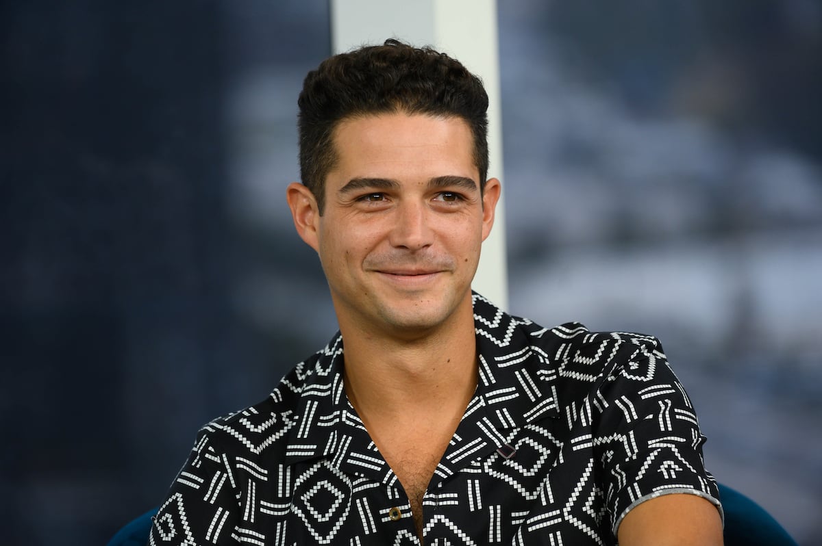 Wells Adams smiles at an event.