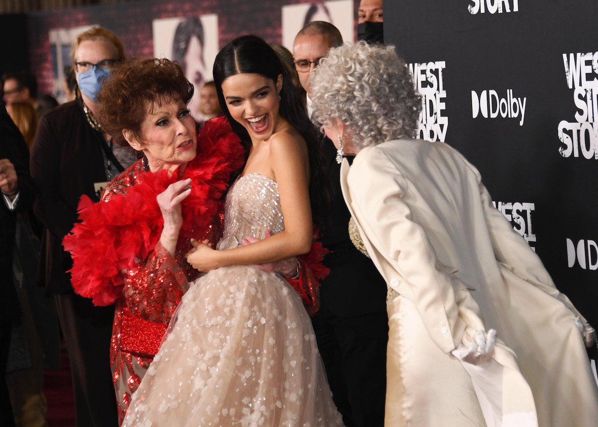 Carol Lawrence, Rachel Zegler, and Rita Moreno laugh together at a premiere Of "West Side Story"