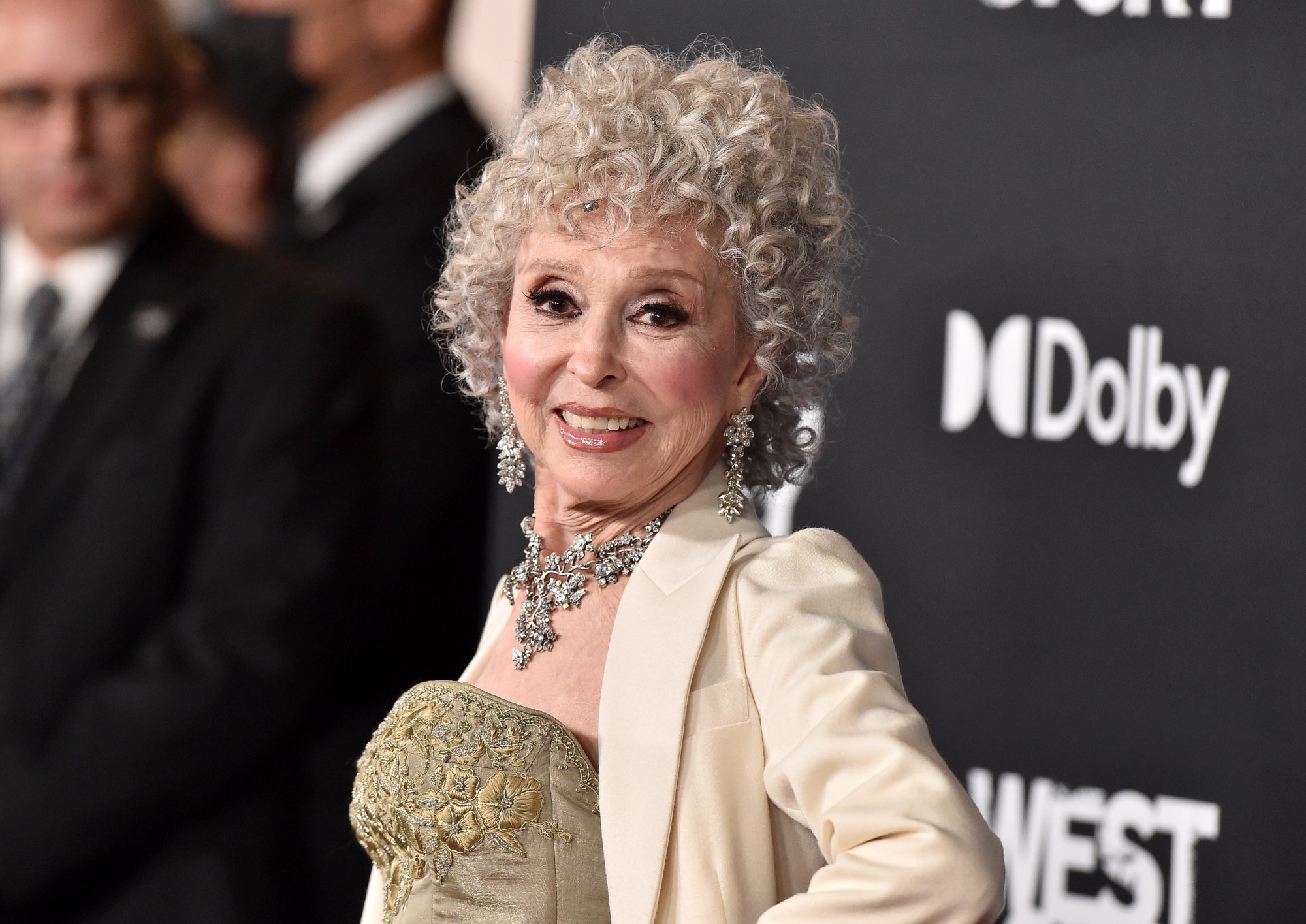 'West Side Story' Rita Moreno smiling in front of the 'West Side Story' and Dolby step and repeat