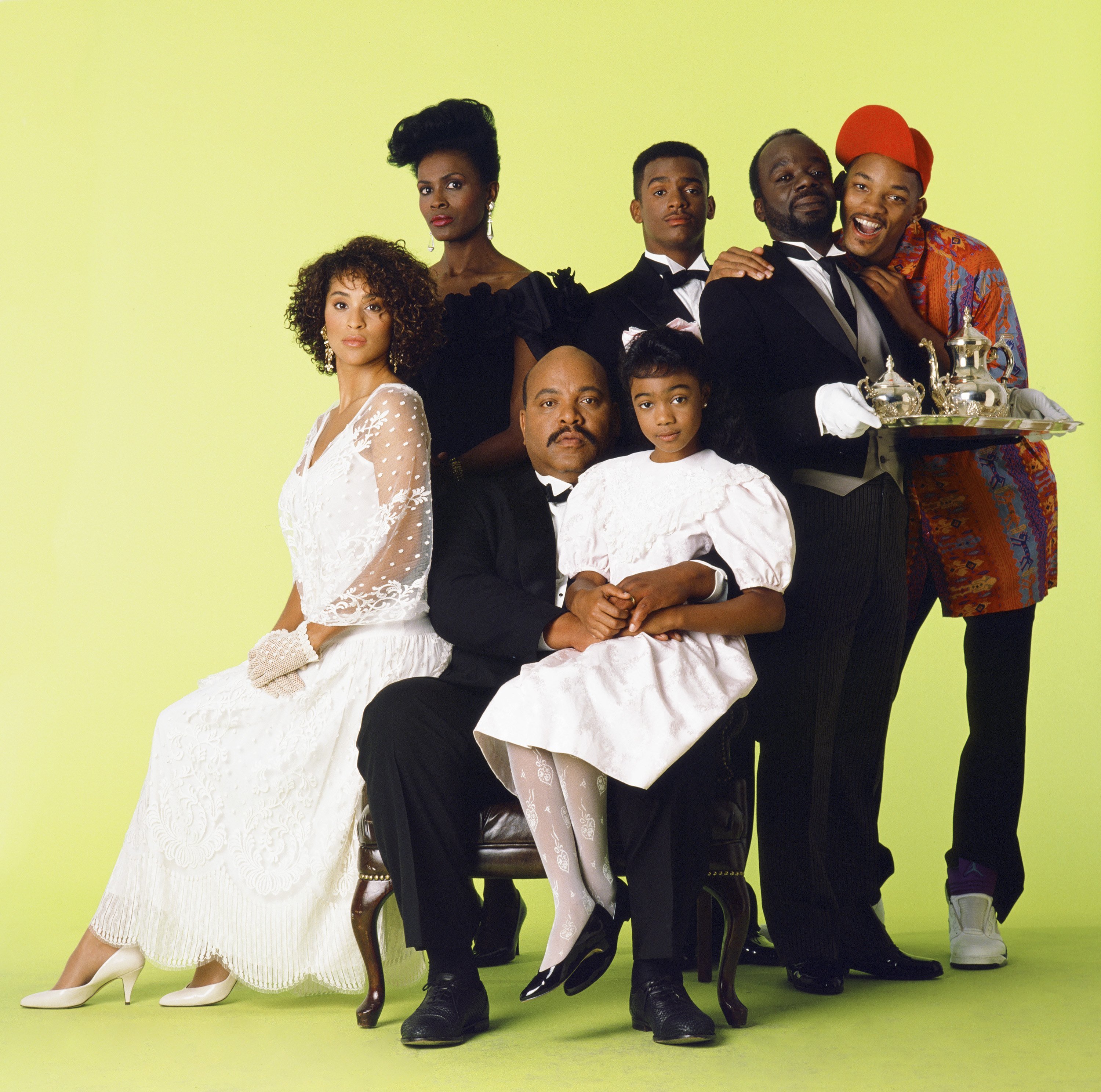 Will Smith hugs Joe Marcell while 'The Fresh Prince of Bel-Air' cast sits for a portrait
