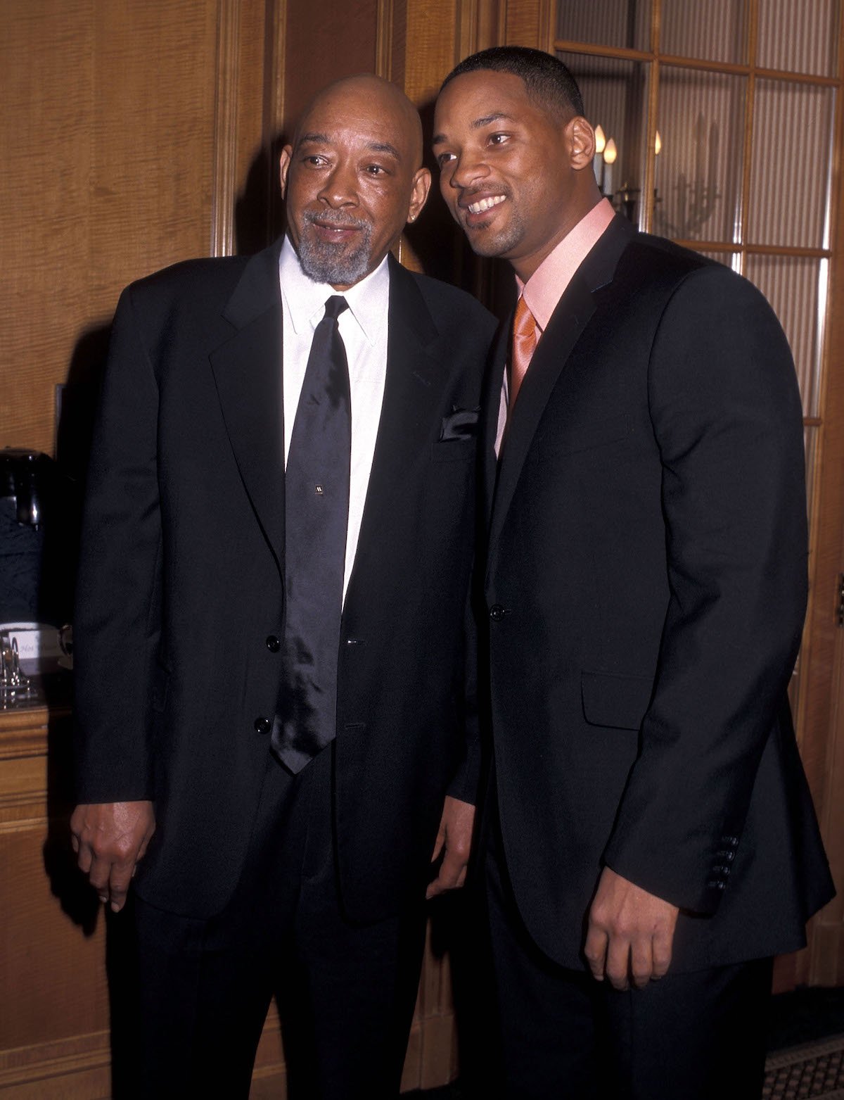 Willard Smith Sr. and Will Smith pose together at an event.