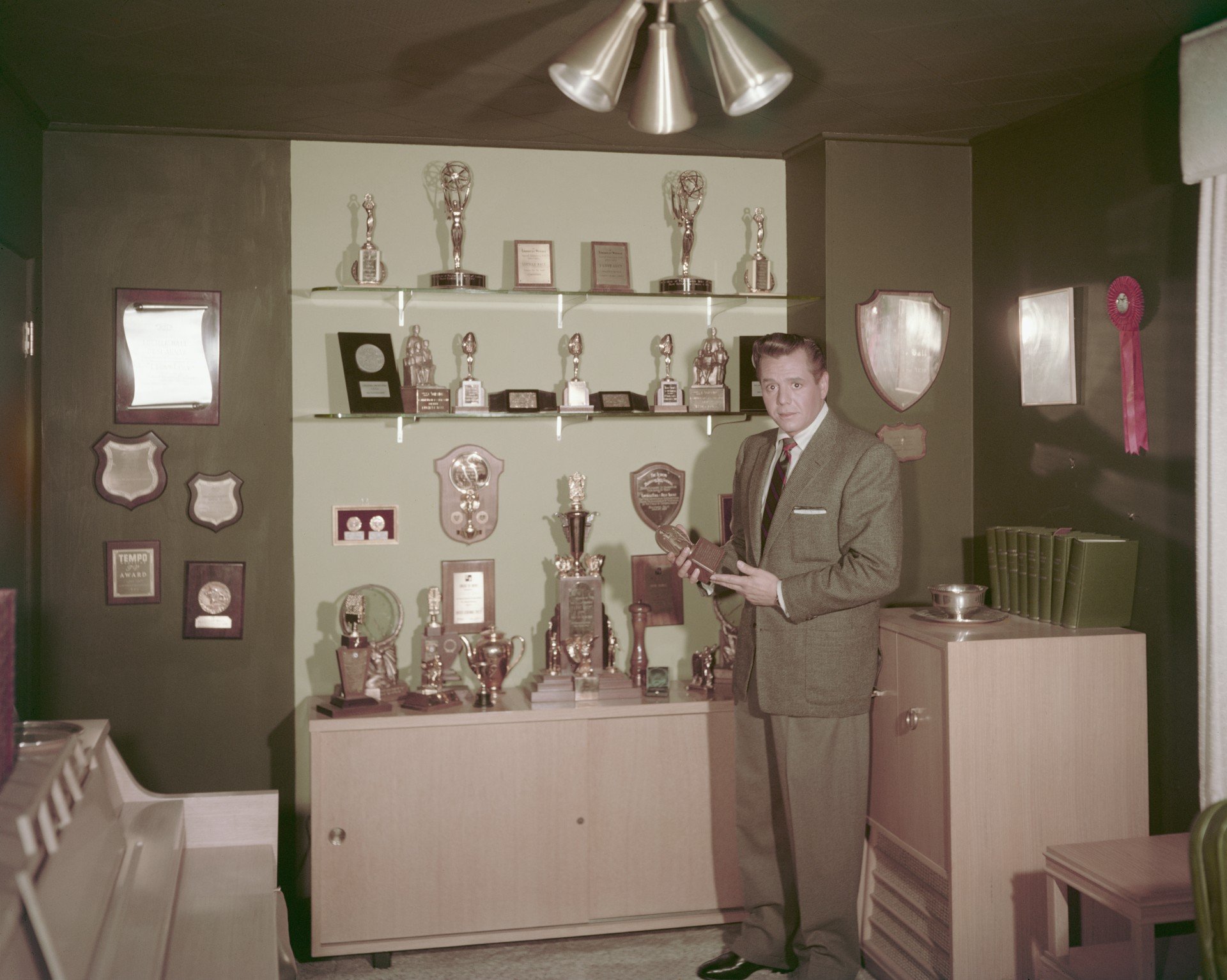 Desi Arnaz holds one of his awards