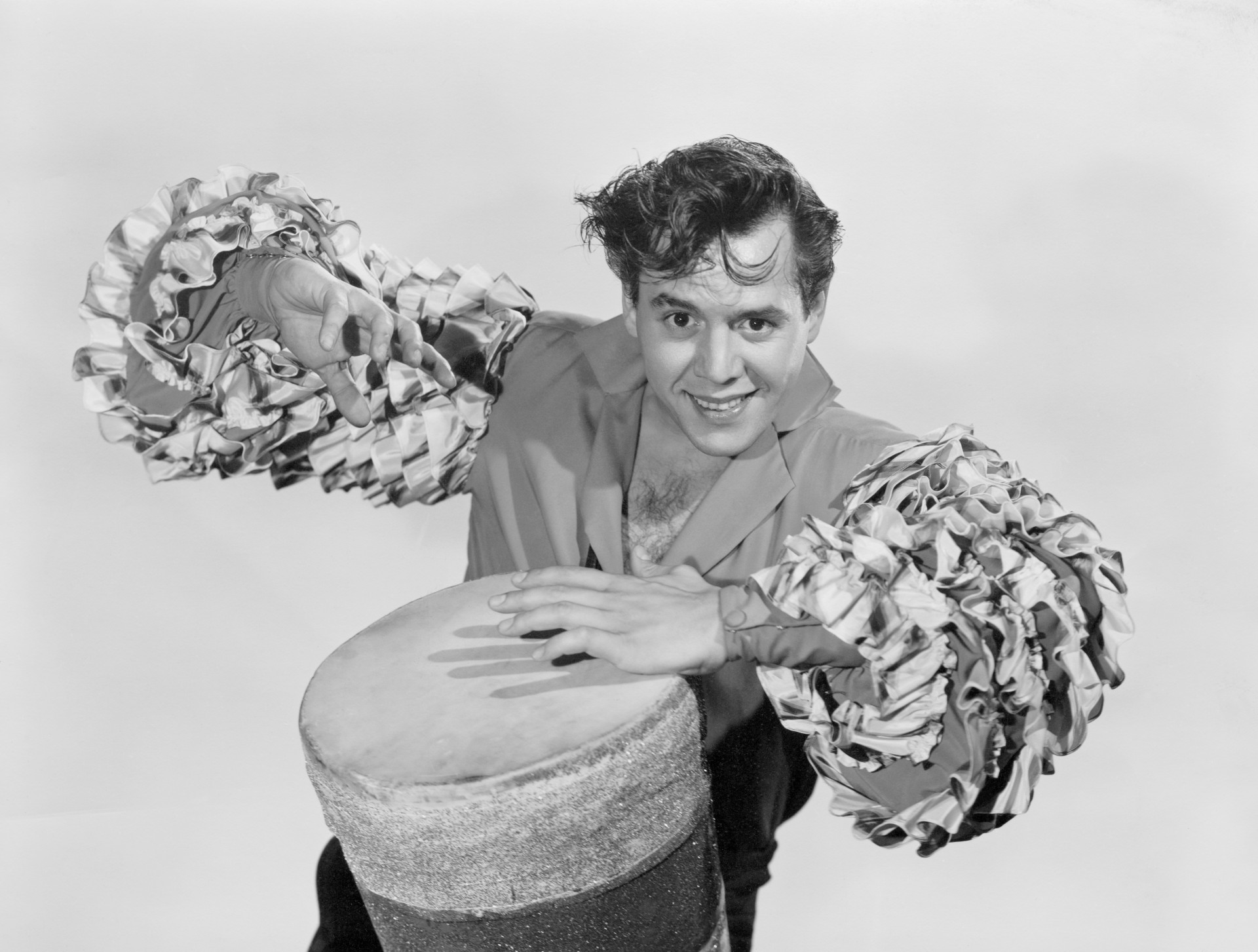 Desi Arnaz plays the drums