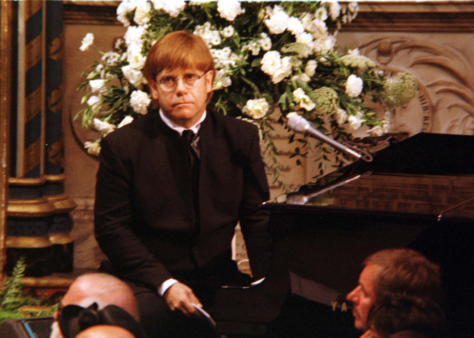 Elton John at a piano during Princess Diana's funeral