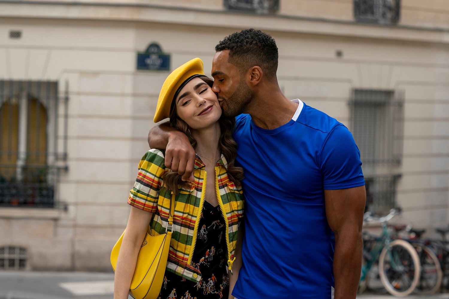 Lily Collins as Emily Cooper and Lucien Laviscount as Alfie in Emily in Paris Season 2