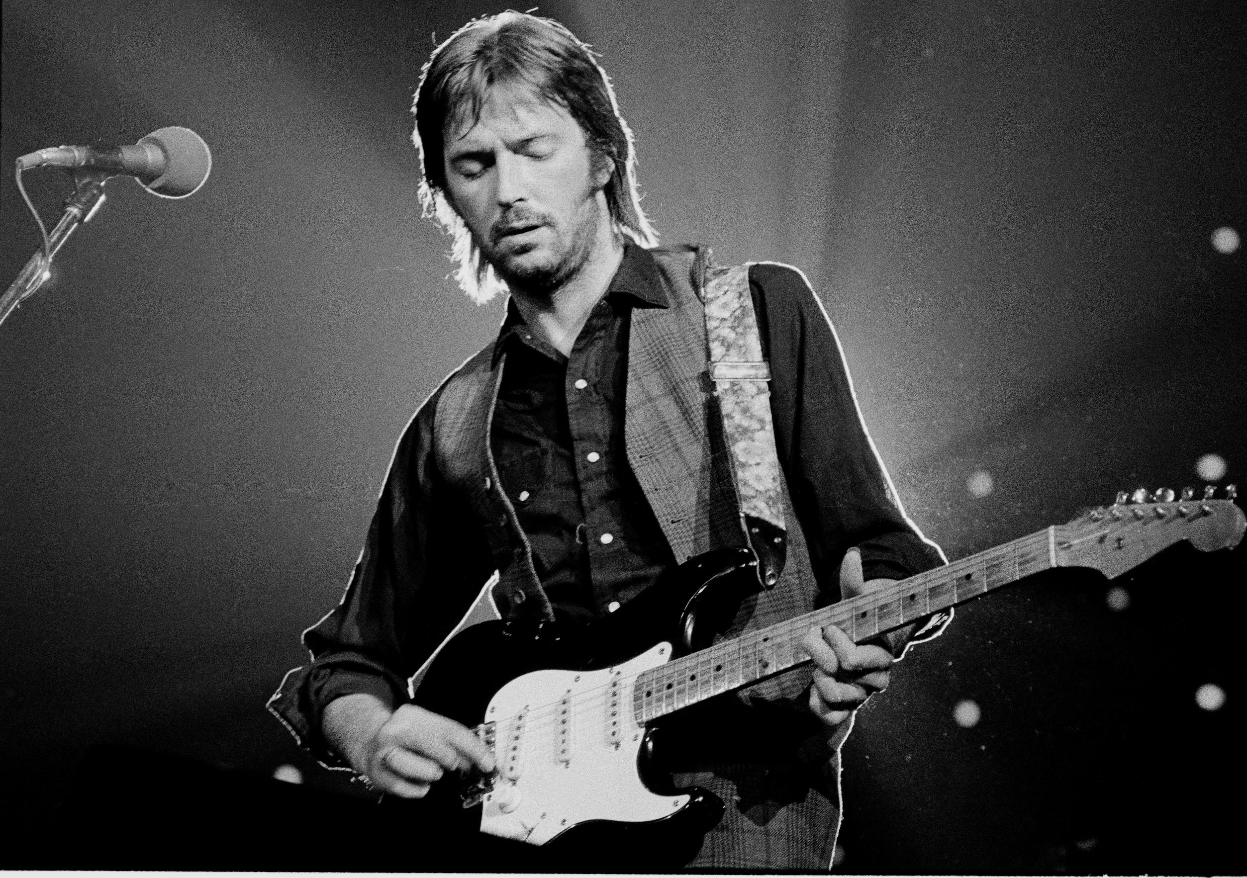 Eric Clapton playing songs on his guitar