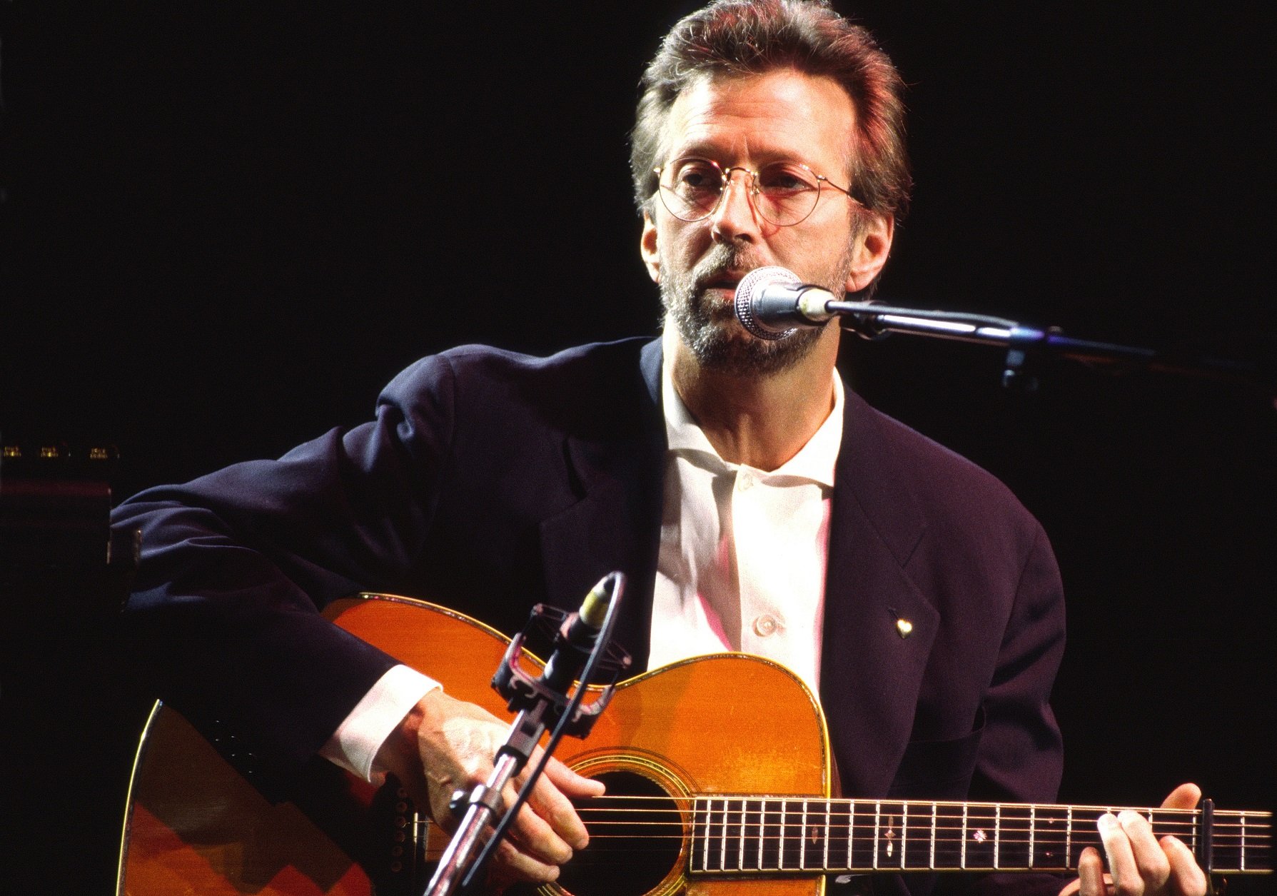 Eric Clapton playing songs on his guitar