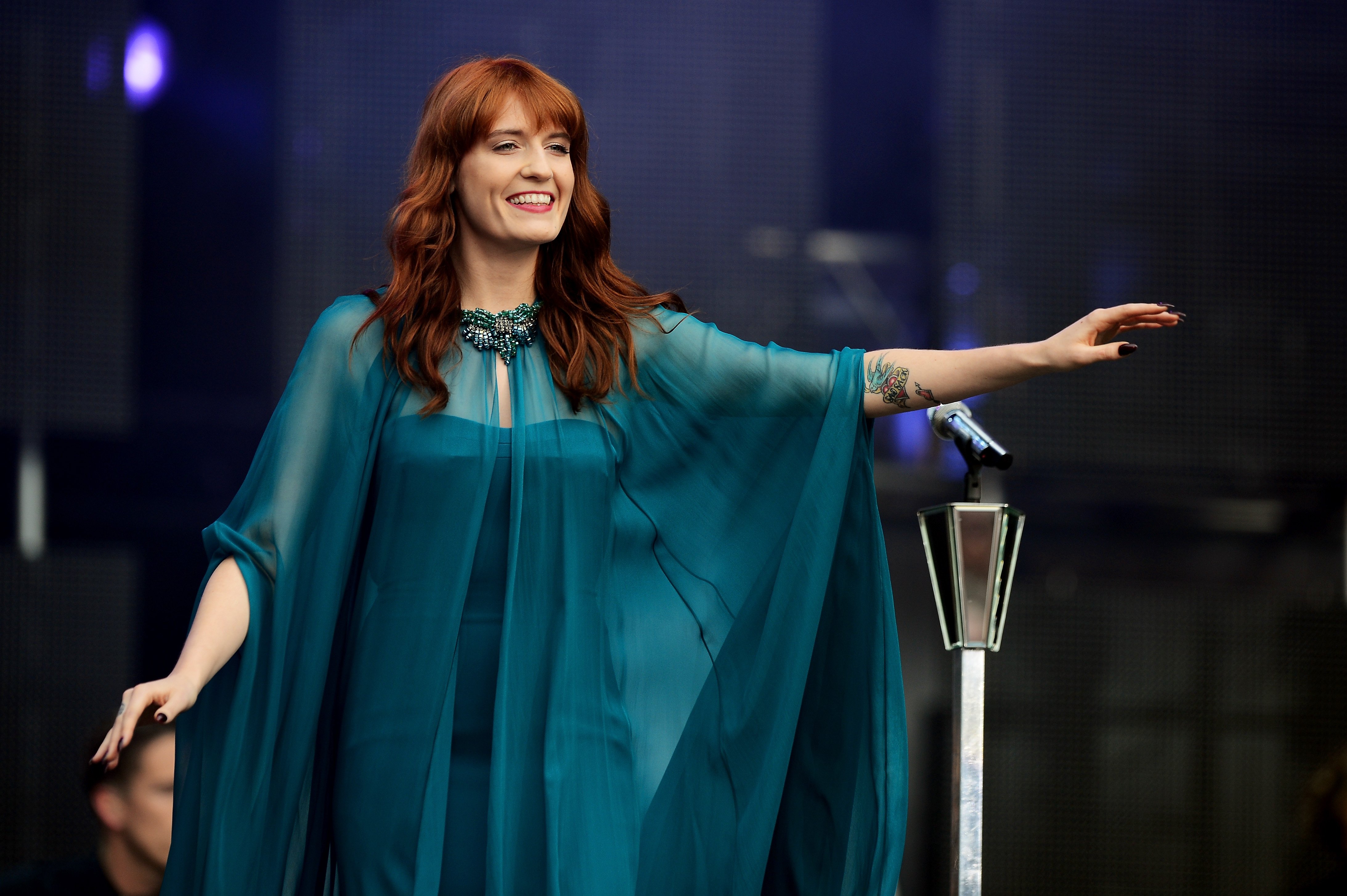 Florence Welch of Florence and the Machine wearing a blue outfit