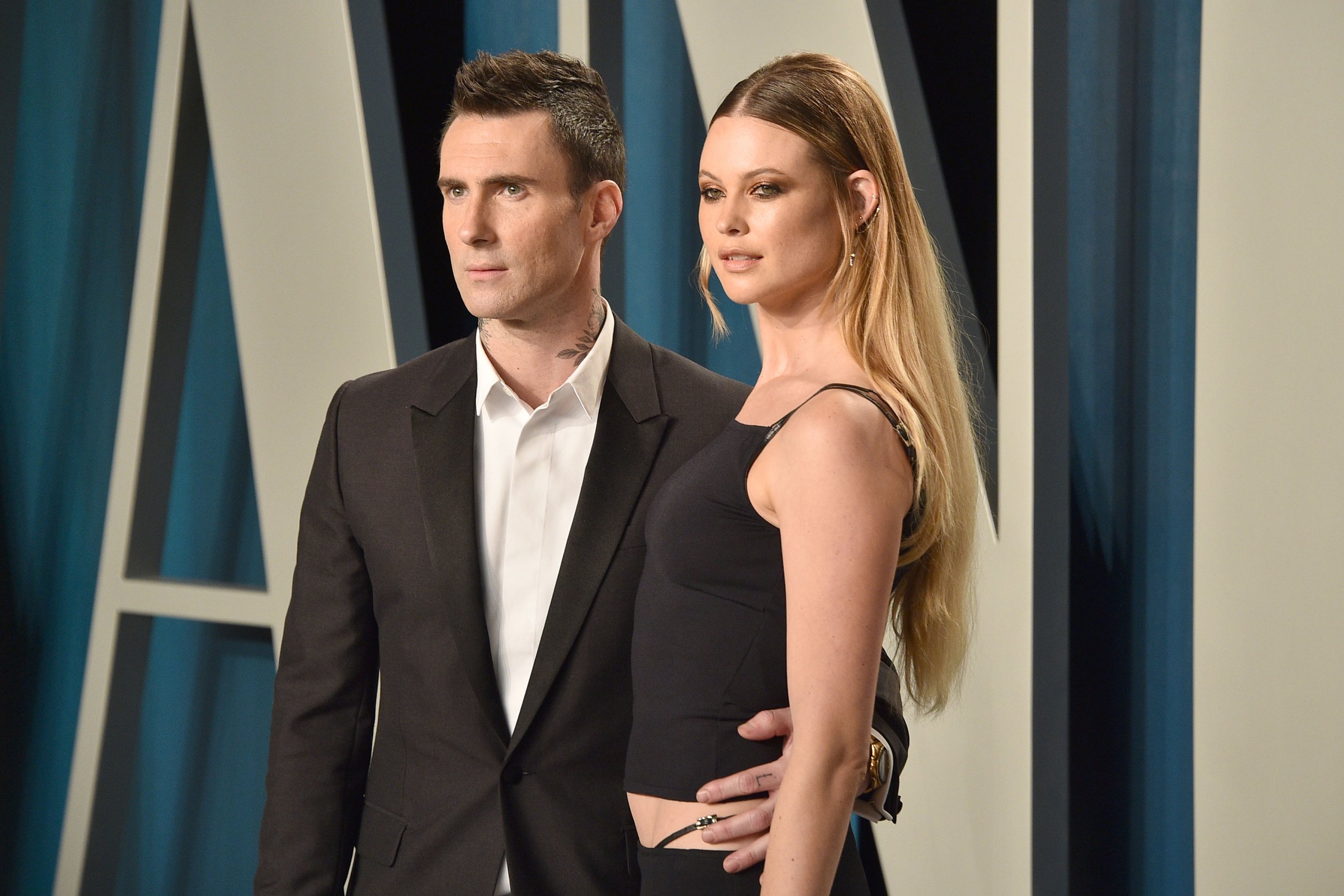 Maroon 5's Adam Levine with his arm around Behati Prinsloo