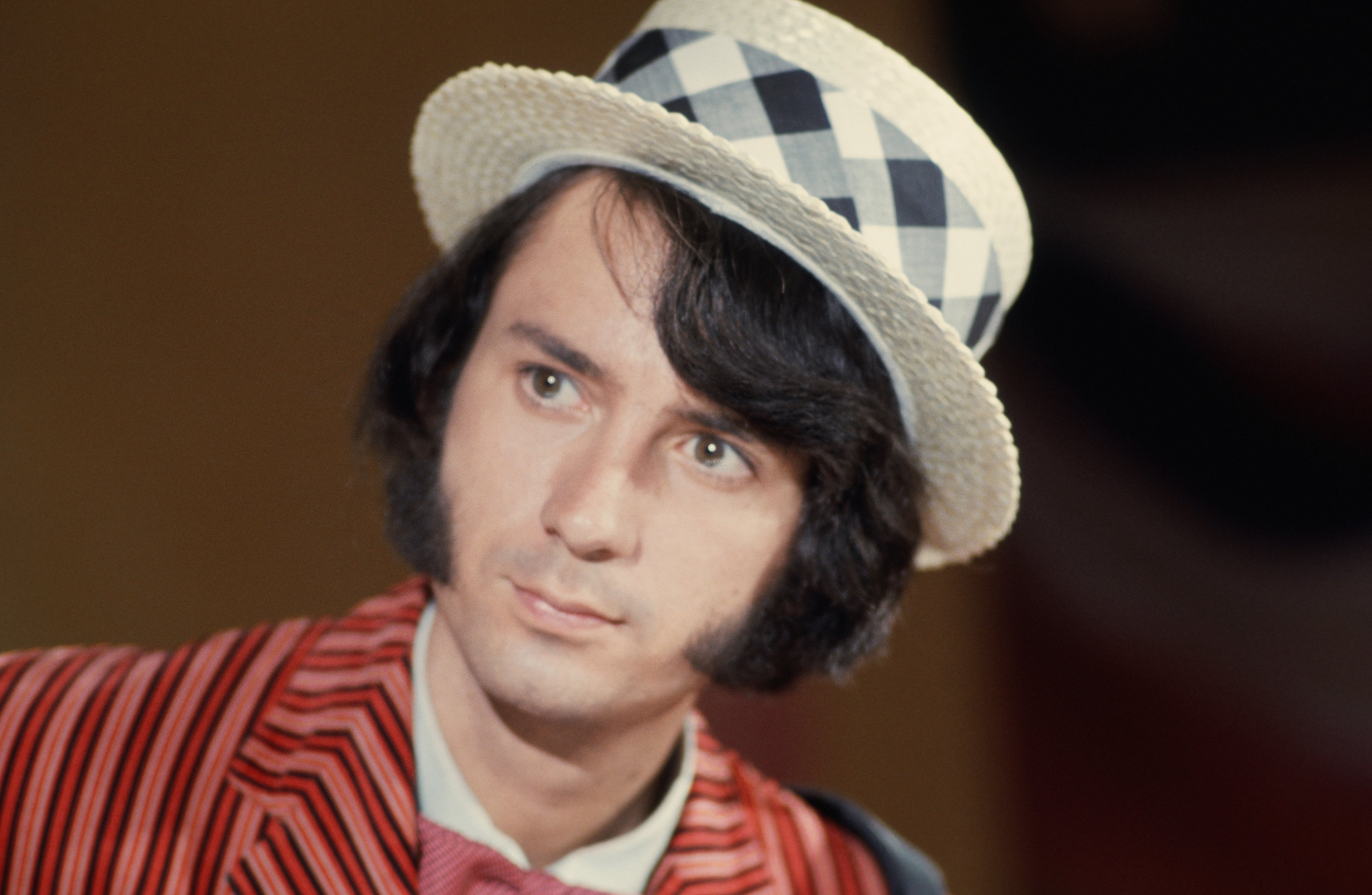 Mike Nesmith of The Monkees wearing a hat