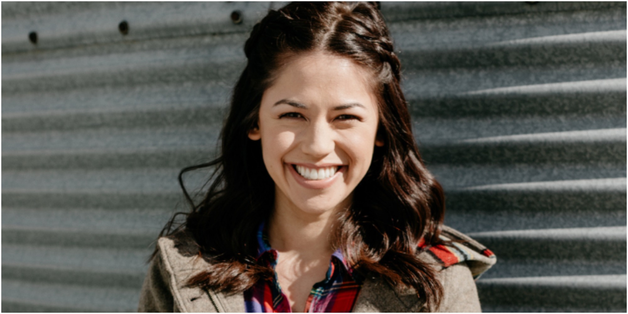 Molly Yeh the star of Girl Meets Farm smiles for the camera.