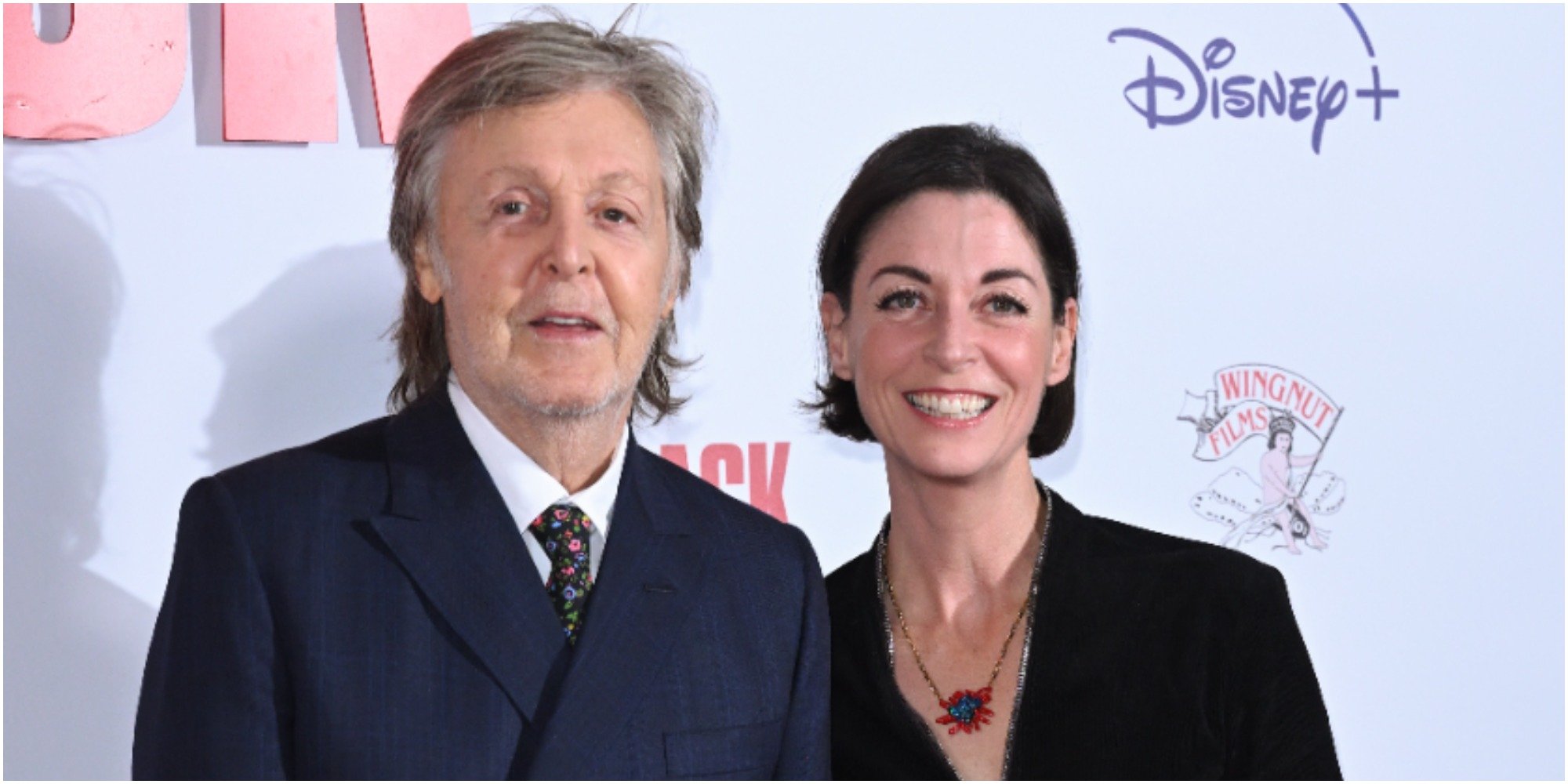 Paul McCartney and his daughter Mary pose on the red carpet for the premiere of "Get Back."