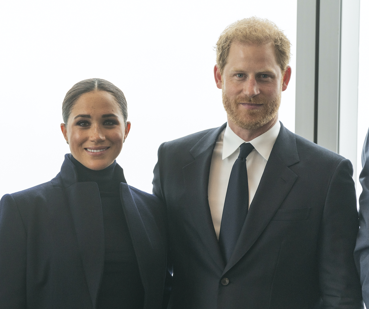 Prince Harry and Meghan Markle both dressed in black, pose while visiting One World Observatory of Freedom Tower of World Trade Center