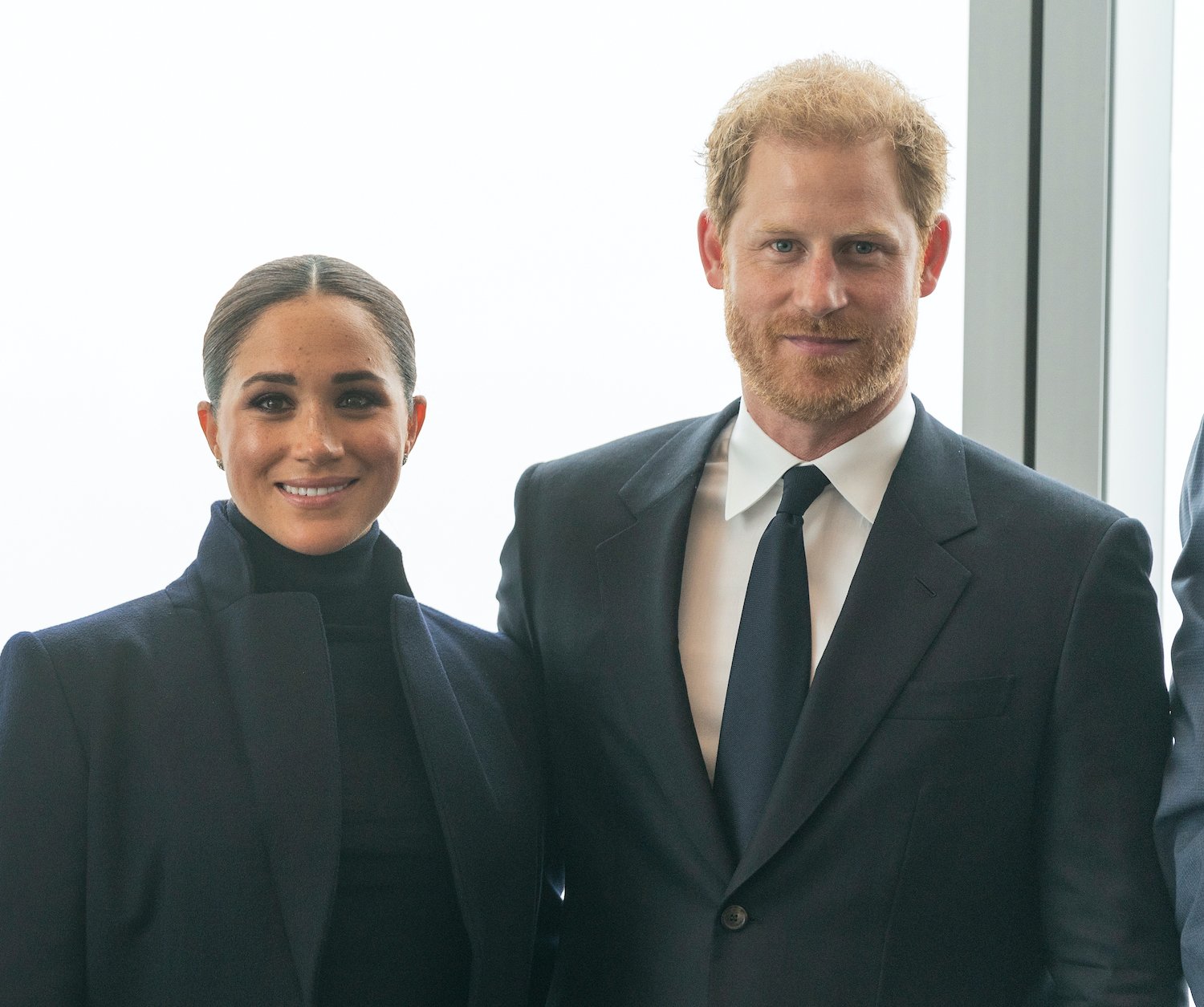 Prince Harry and Meghan Markle both dressed in black, pose while visiting One World Observatory of Freedom Tower of World Trade Center