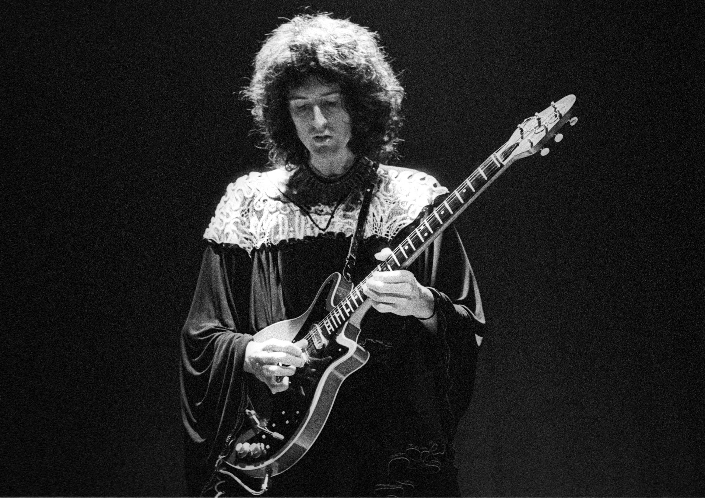 Brian May of Queen with a guitar