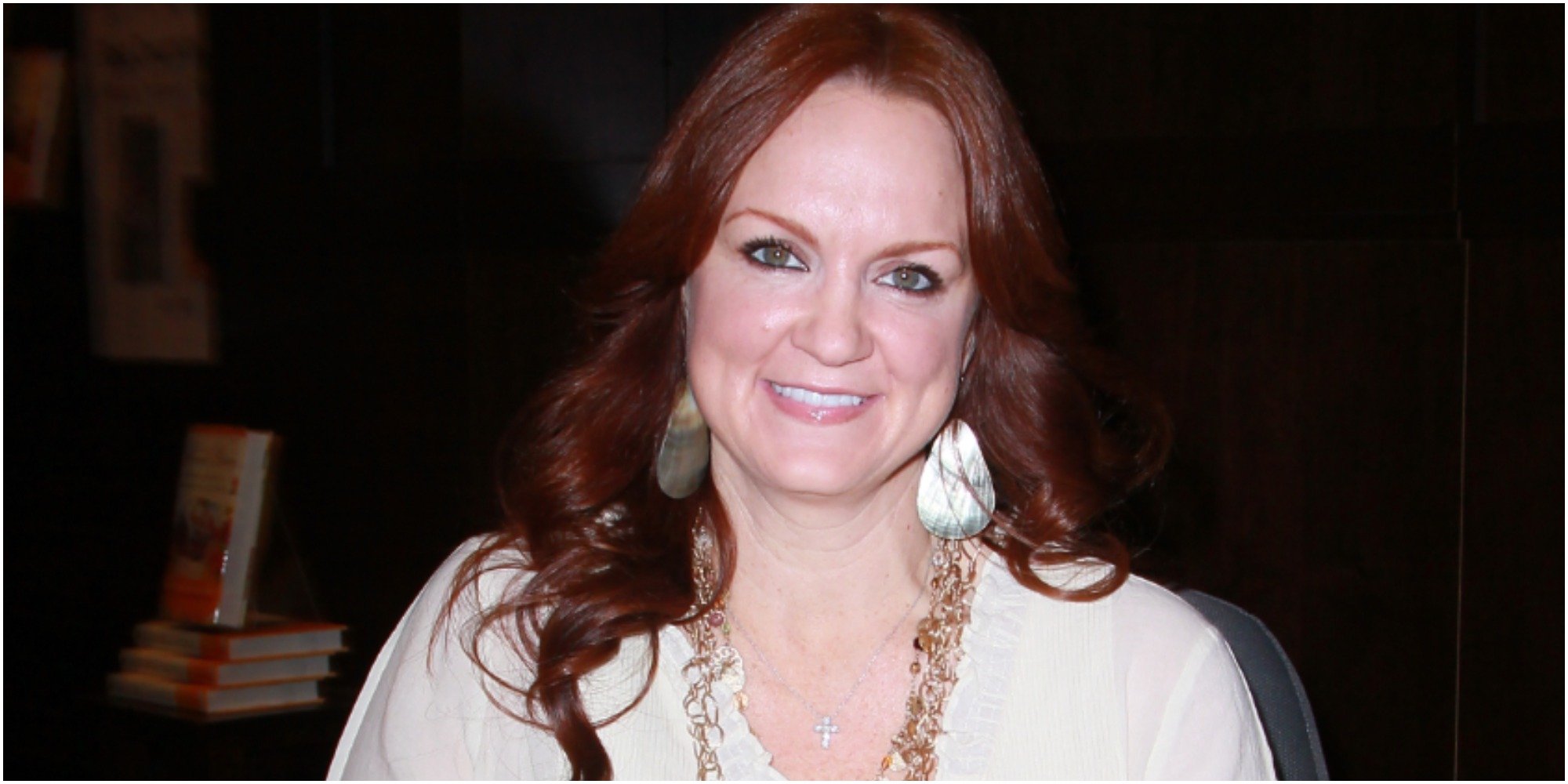 Ree Drummond wears a white shirt at a book signing.