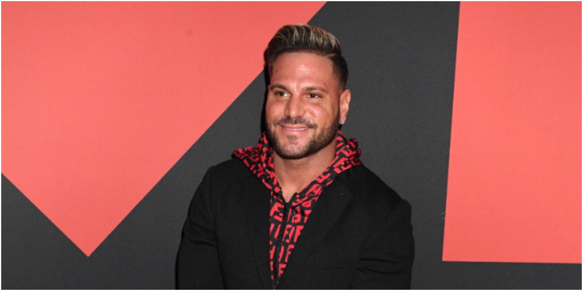 Ronnie Ortiz Magro poses on the red carpet.