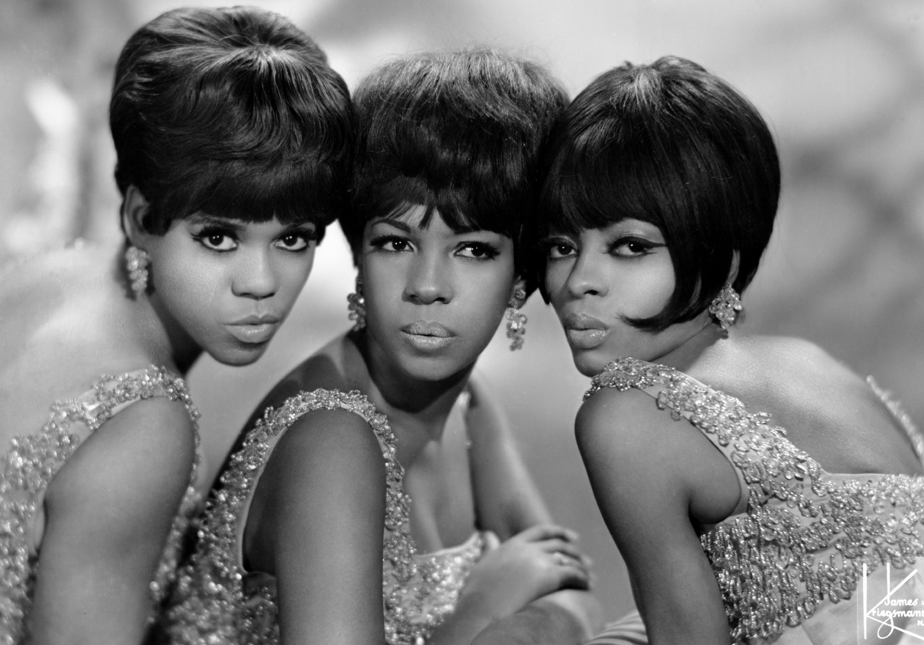 The Supremes wearing earrings
