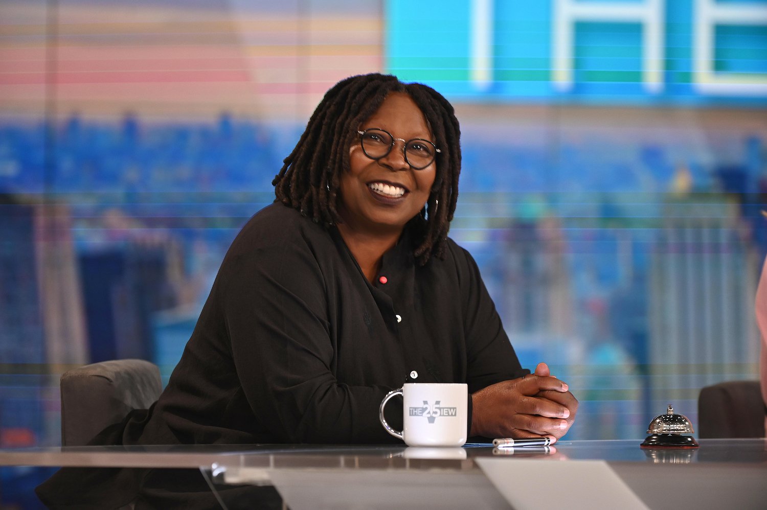 Whoopi Goldberg smiling on the set of 'The View'