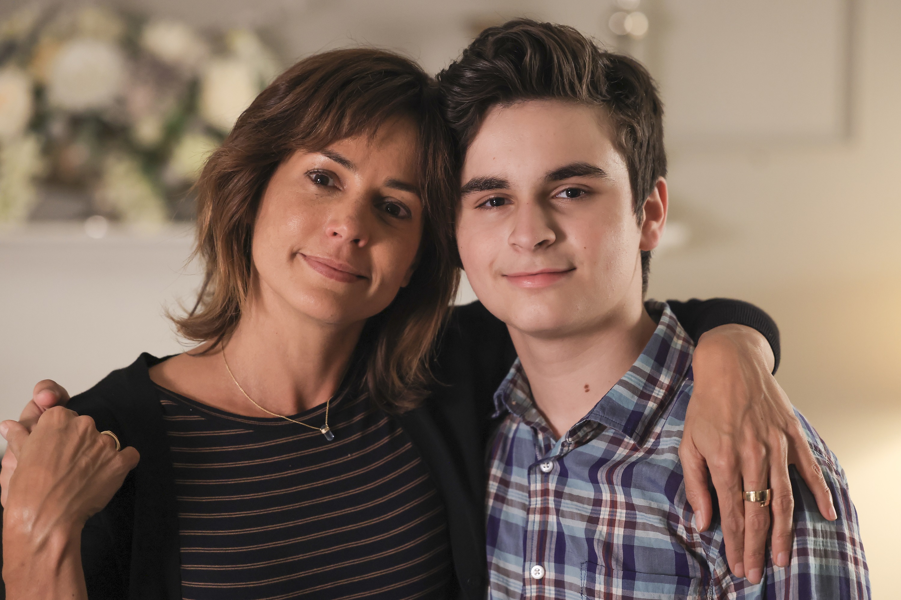 'A Million Little Things' Stephanie Szostak and Chance Hurstfield pose together for the last time before their return in 2022.