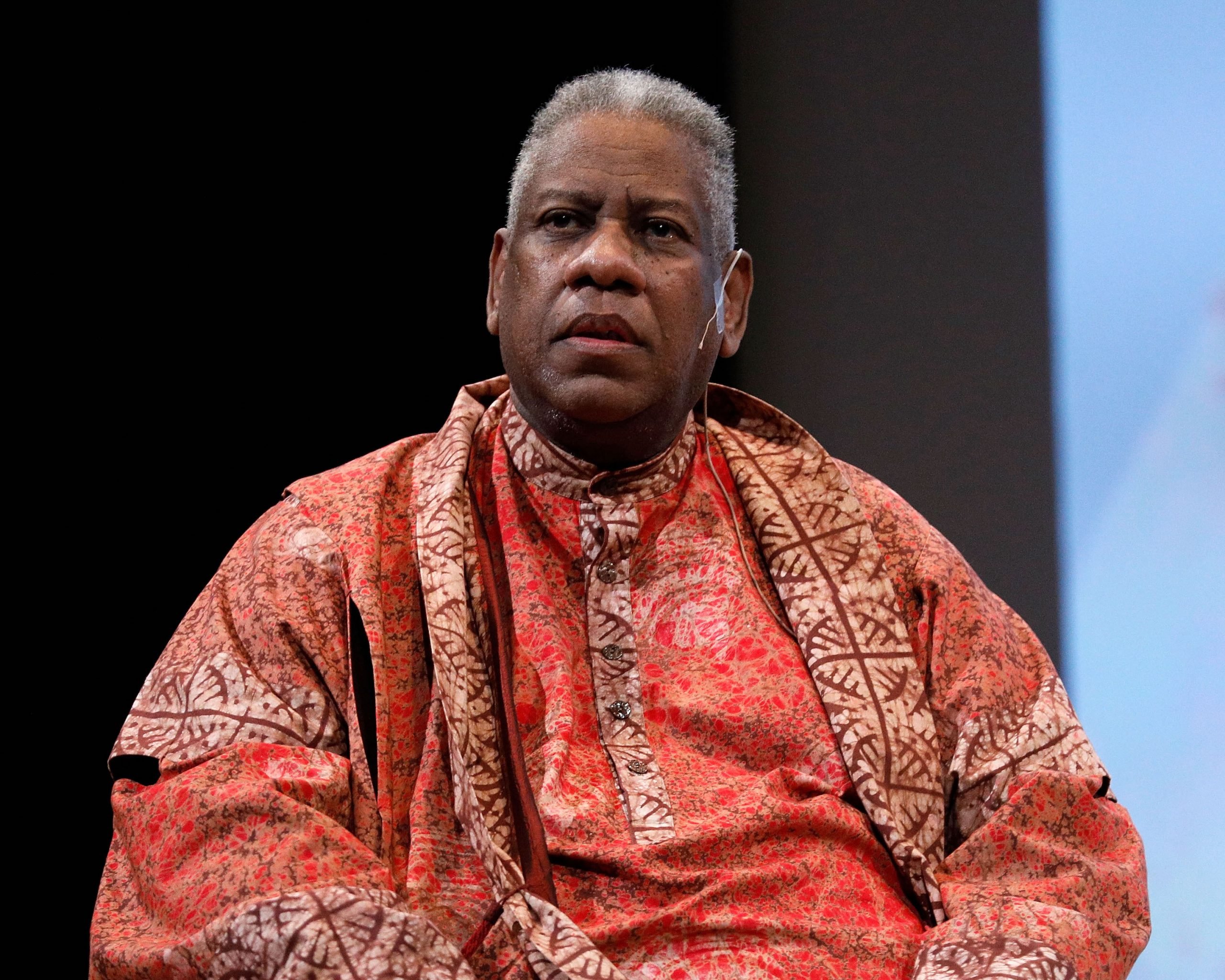 André Leon Talley wearing orange