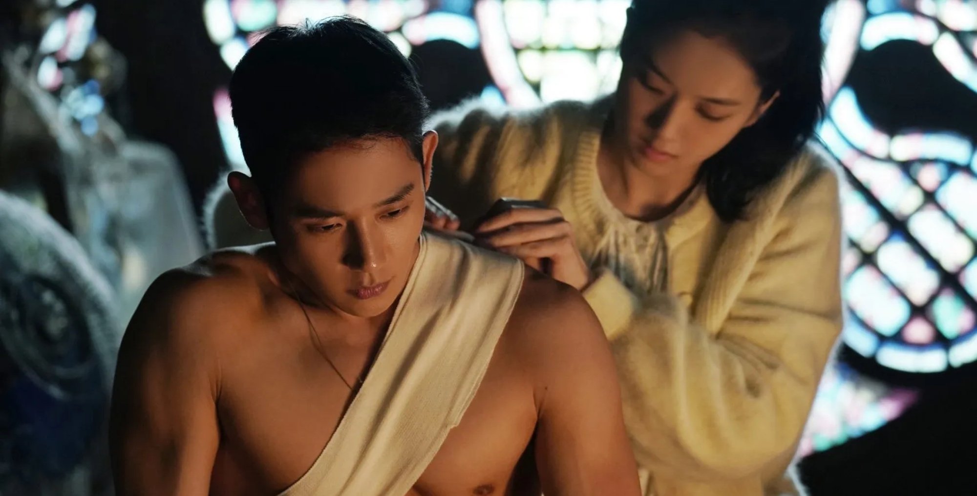 Actor Jung Hae-in as Im-soo in 'Snowdrop' shirtless and getting shoulder bandaged.