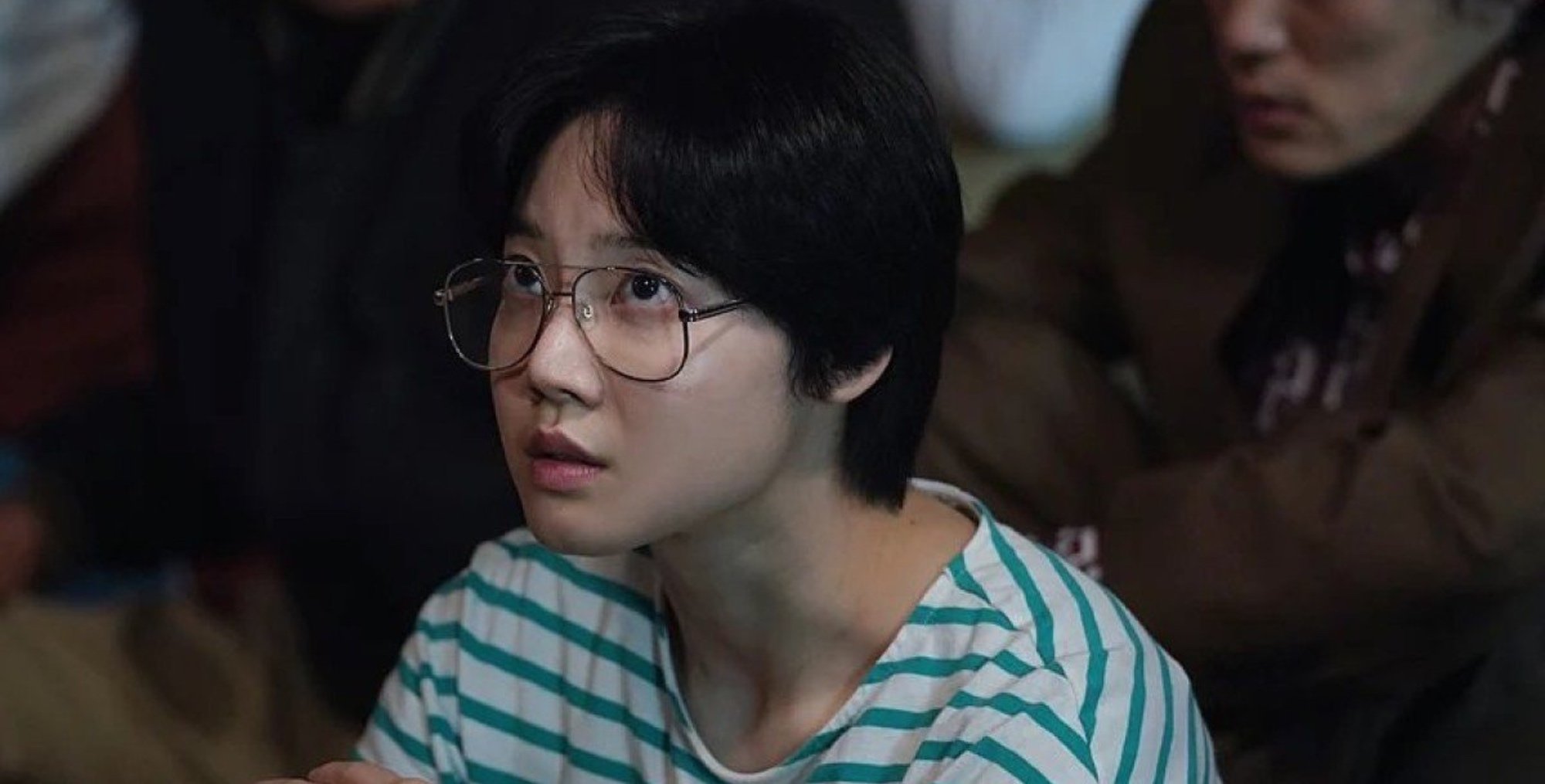 Actor Kim Mi-soo in 'Snowdrop' wearing green striped shirt.