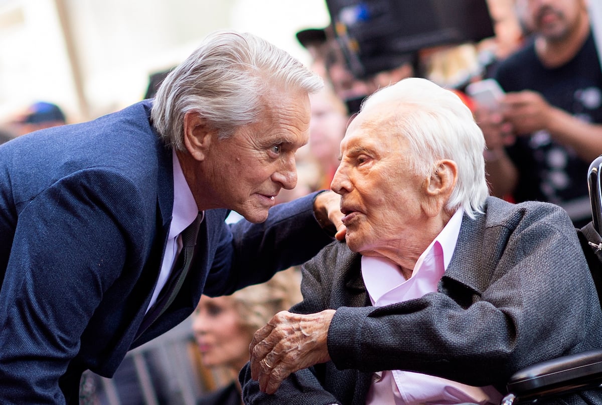 Actor Kirk Douglas (R) attends a ceremony honoring his son actor Michael Douglas (L) with a star on Hollywood Walk of Fame in 2018