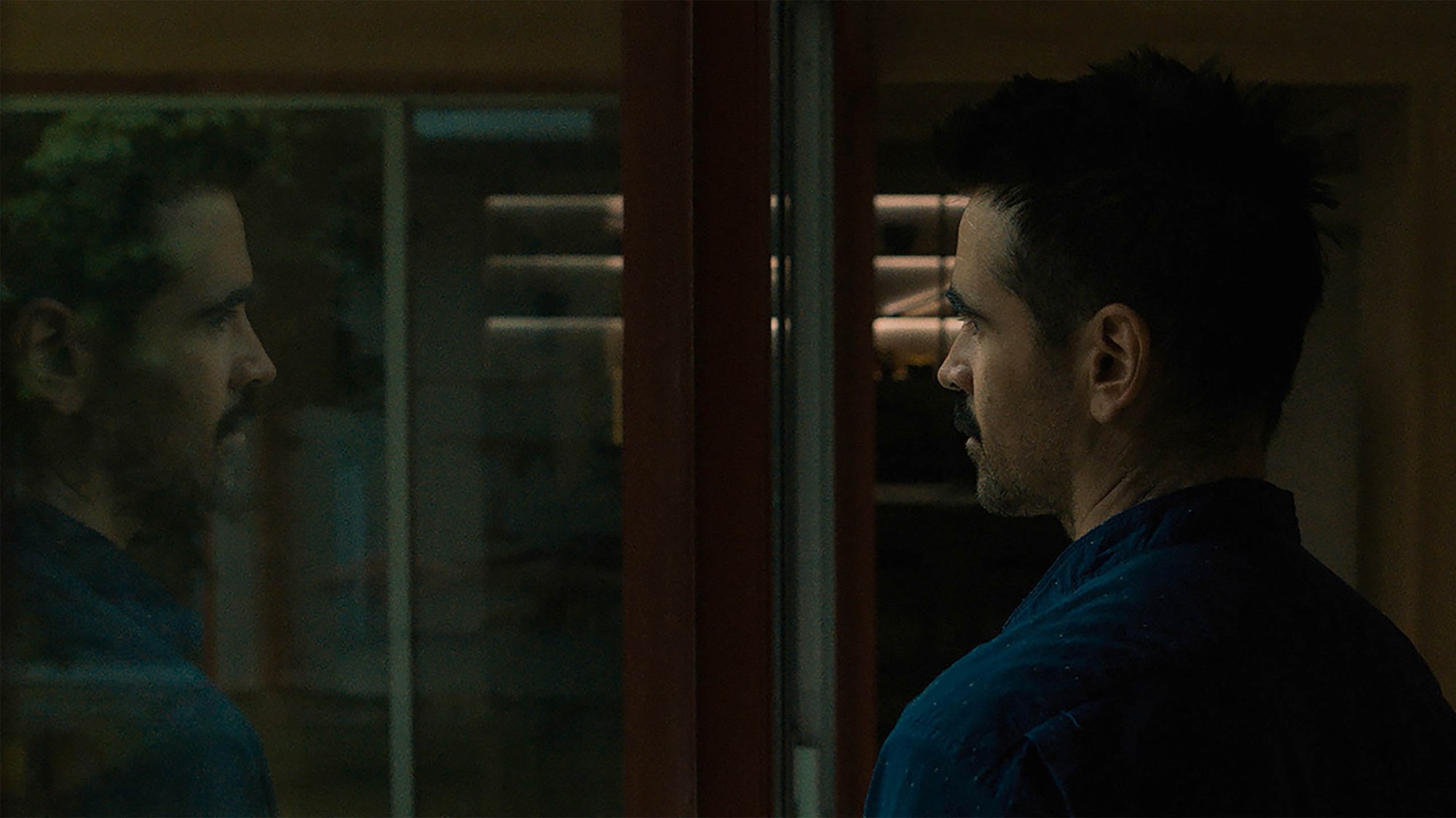 'After Yang' Colin Farrell as Jake looking out the window