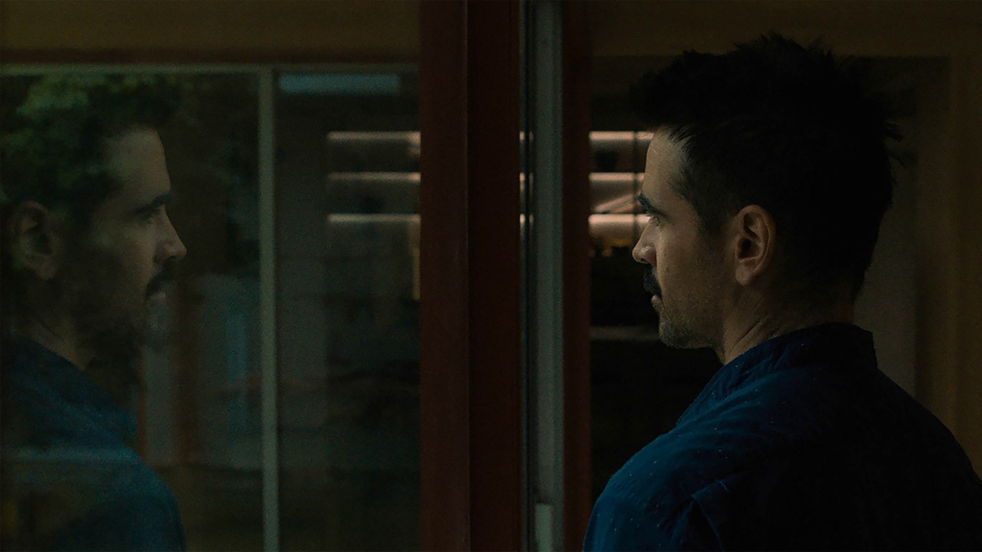 'After Yang' Colin Farrell as Jake looking out the window