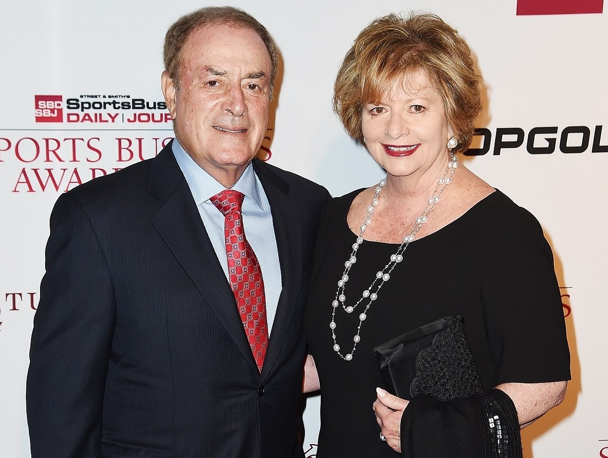Al Michaels and his wife, Linda Anne Stamaton, pose for photo as they arrive at the Sports Business Awards