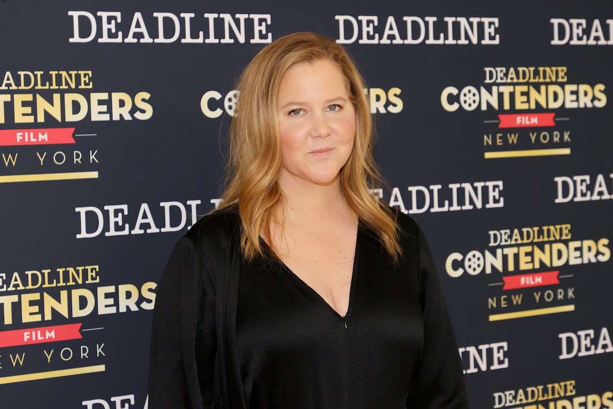 Amy Schumer smiles at an event.