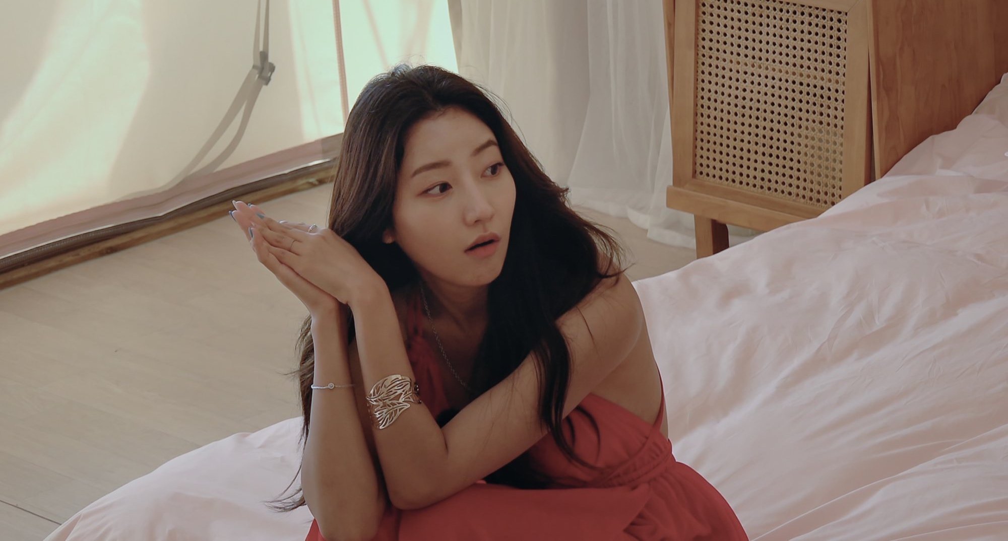 An Yea-won on 'Single's Inferno' wearing red dress inside tent.