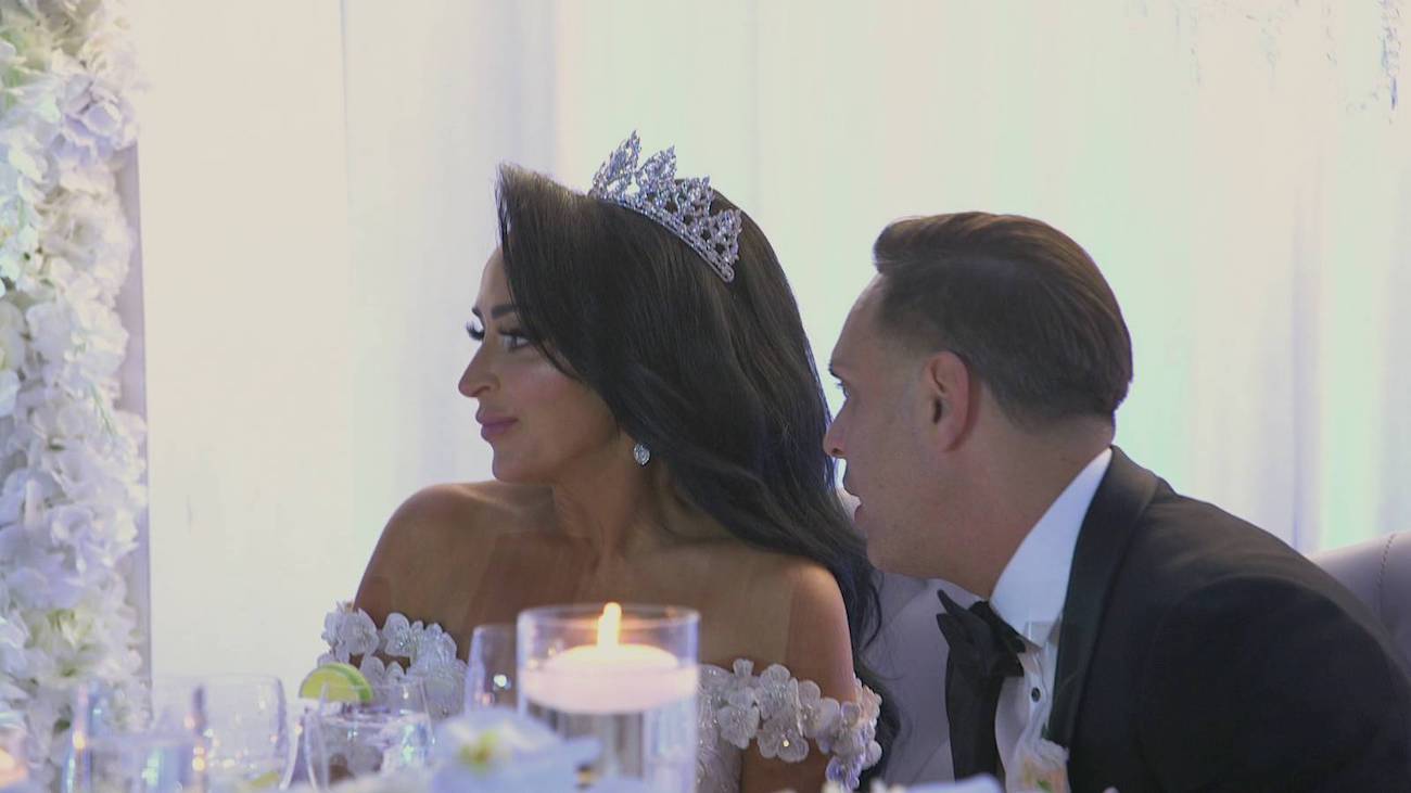 Angelina and Chris Larangeira sit at the sweetheart table during their wedding from 'Jersey Shore: Family Vacation' Season 3
