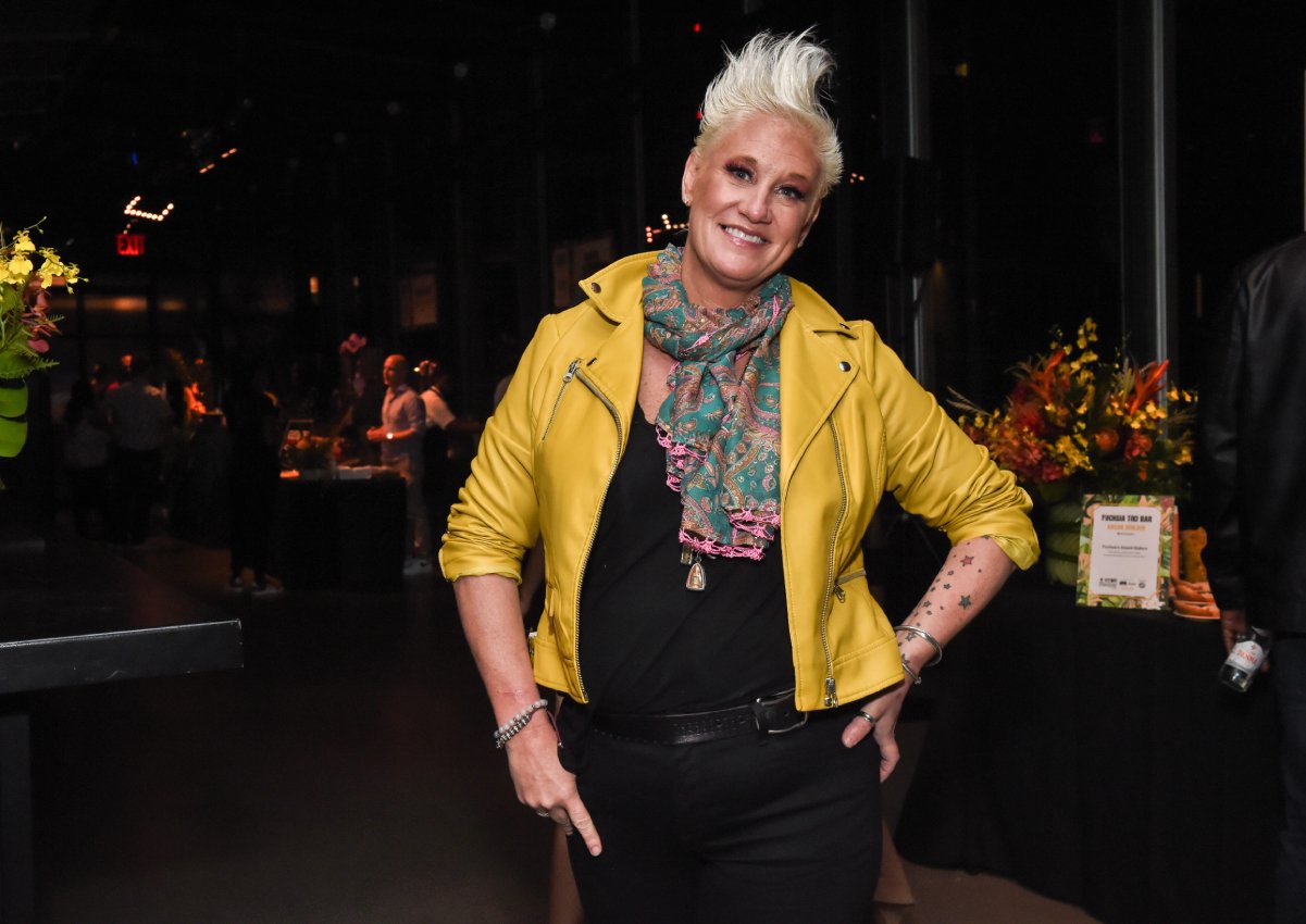 Food Network chef Anne Burrell wears a yellow jacket at a 2019 network event.