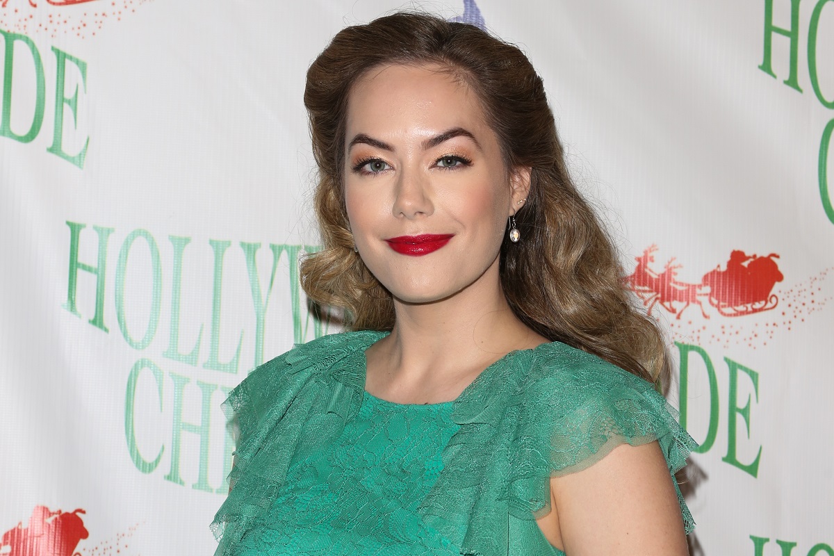 'The Bold and the Beautiful' actor Annika Noelle wearing a green dress and red lipstick.