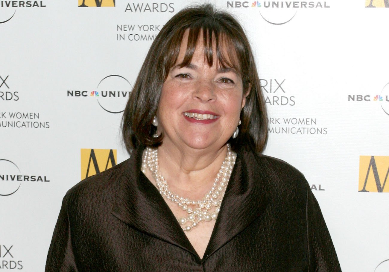 Ina Garten smiles wearing a brown shirt