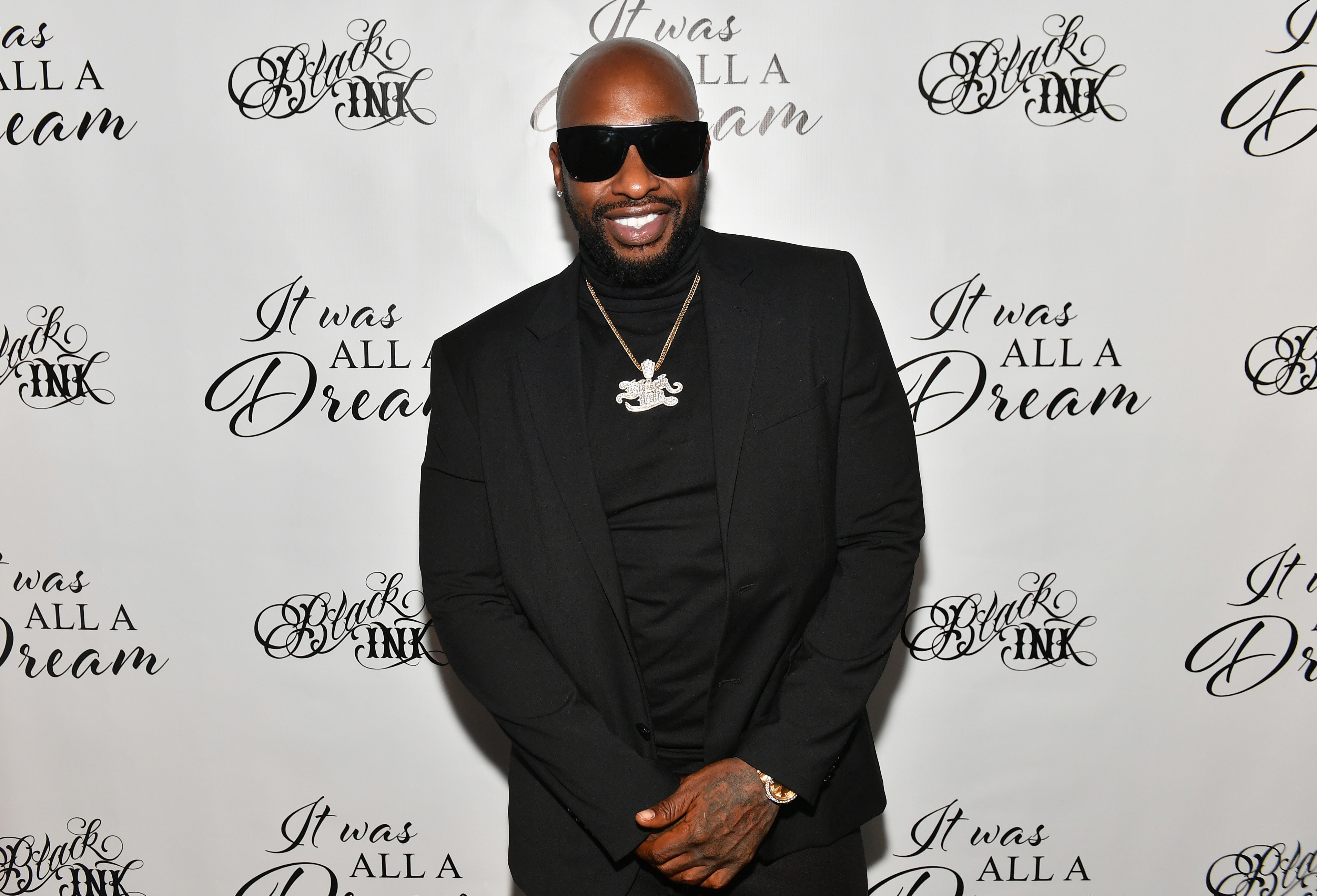 Ceaser Emanuel of Black Ink Crew smiling at the "It Was All A Dream" Black Ink Gallery And Silent Auction