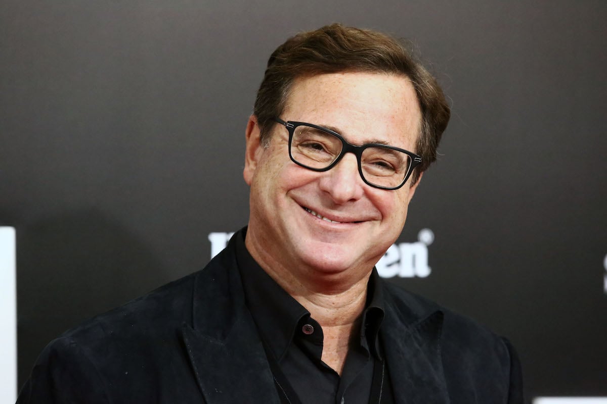 Bob Saget smiles for the camera.