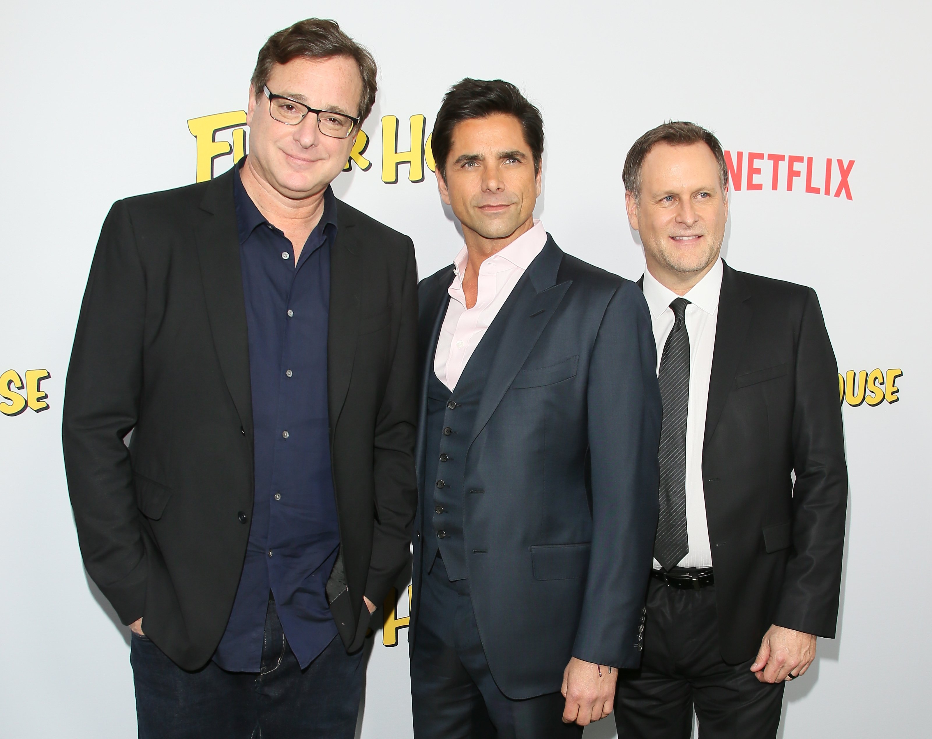 'Full House' co-stars Bob Saget, John Stamos, and Dave Coulier attend the premiere of Netflix's 'Fuller House.'