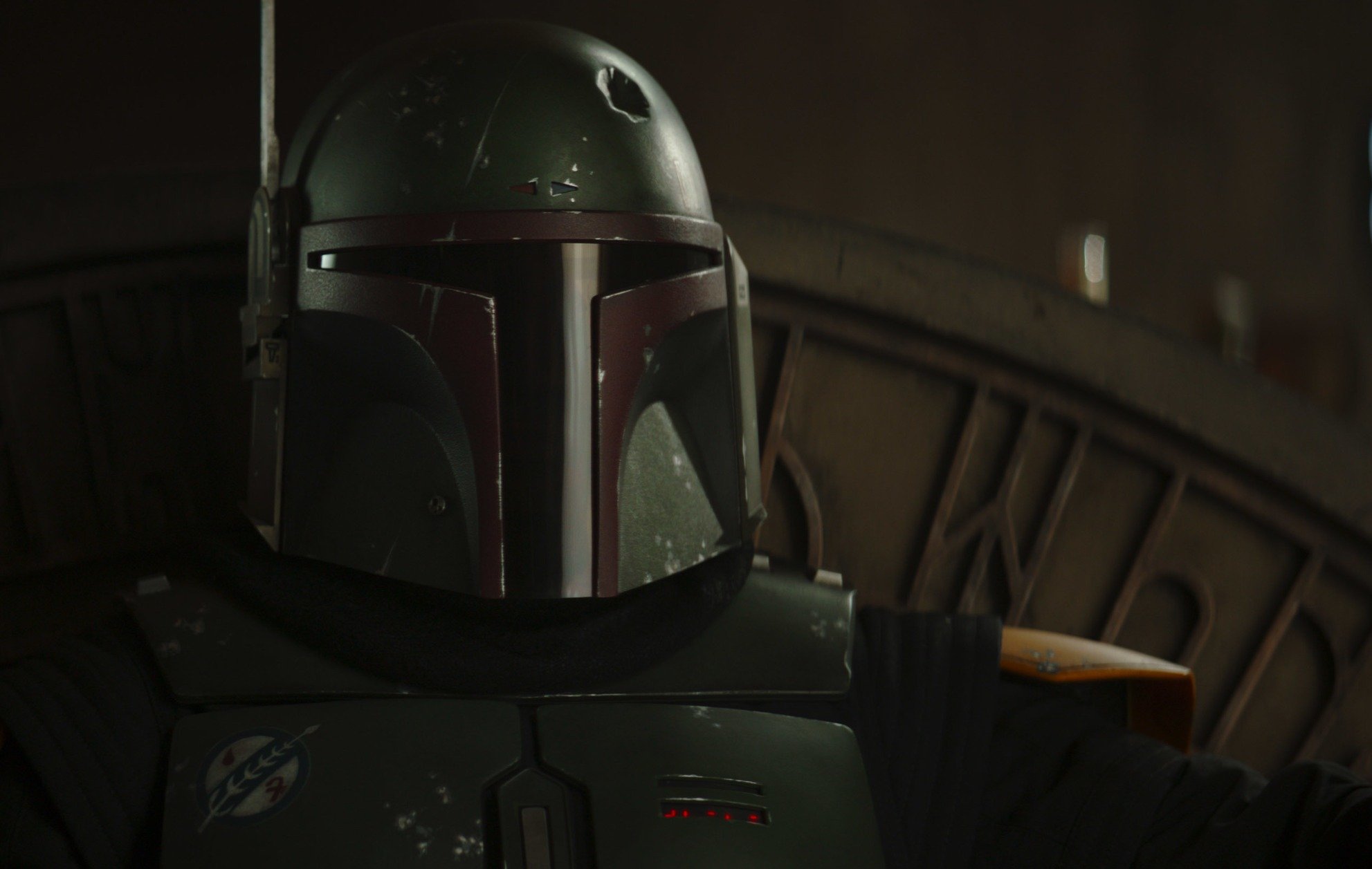 Temuera Morrison as Boba Fett in 'The Book of Boba Fett' on Disney+. He's wearing his helmet.
