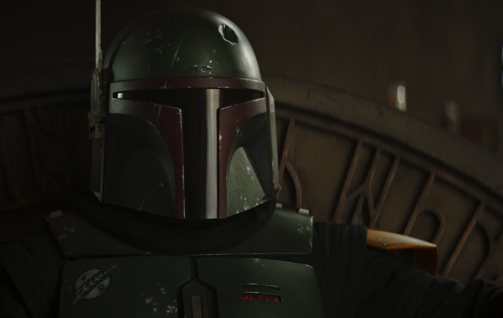 Temuera Morrison as Boba Fett in 'The Book of Boba Fett' on Disney+. He's wearing his helmet.